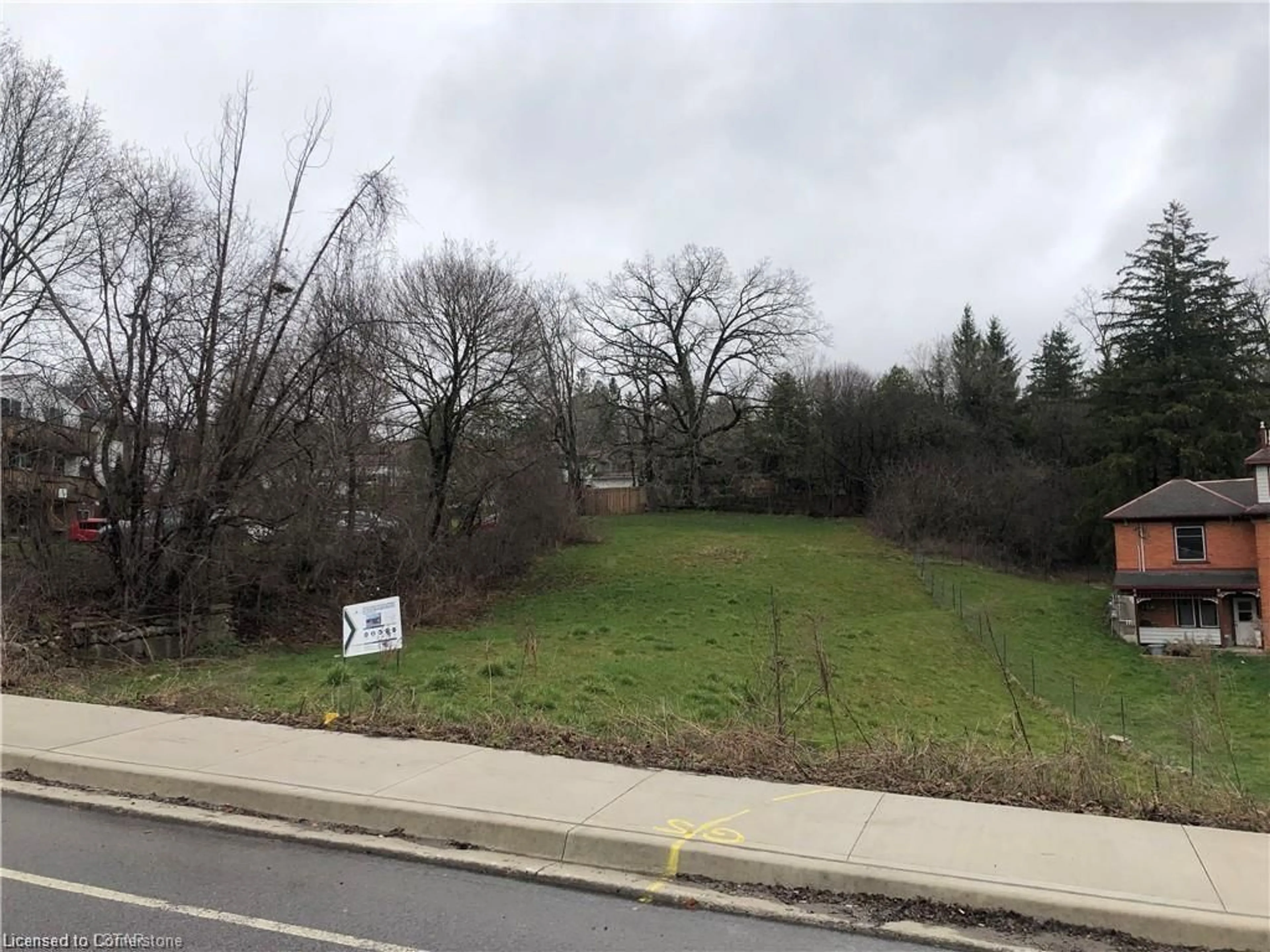 A pic from outside/outdoor area/front of a property/back of a property/a pic from drone, forest/trees view for 26 Bridge St, Kitchener Ontario N2K 1K4