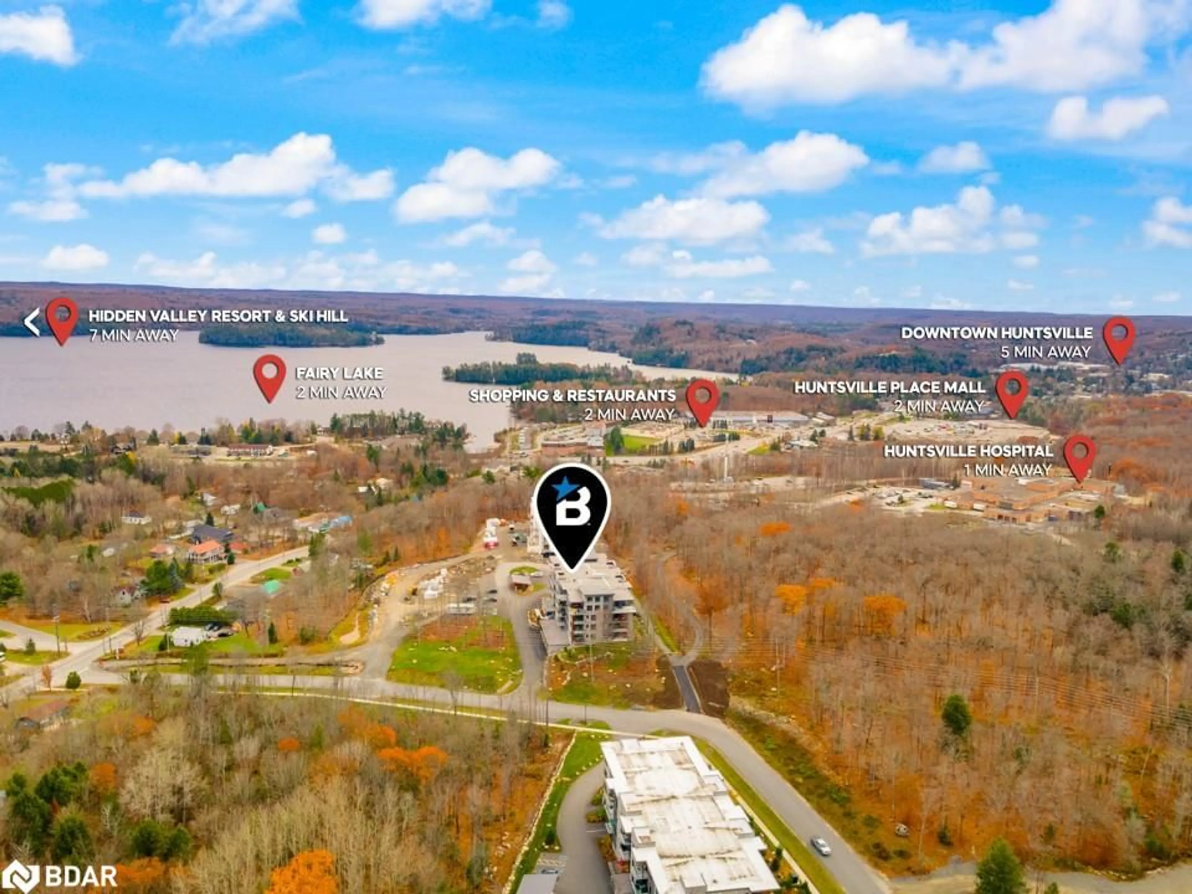 A pic from outside/outdoor area/front of a property/back of a property/a pic from drone, water/lake/river/ocean view for 18 Campus Trail #107, Huntsville Ontario P1H 1C6