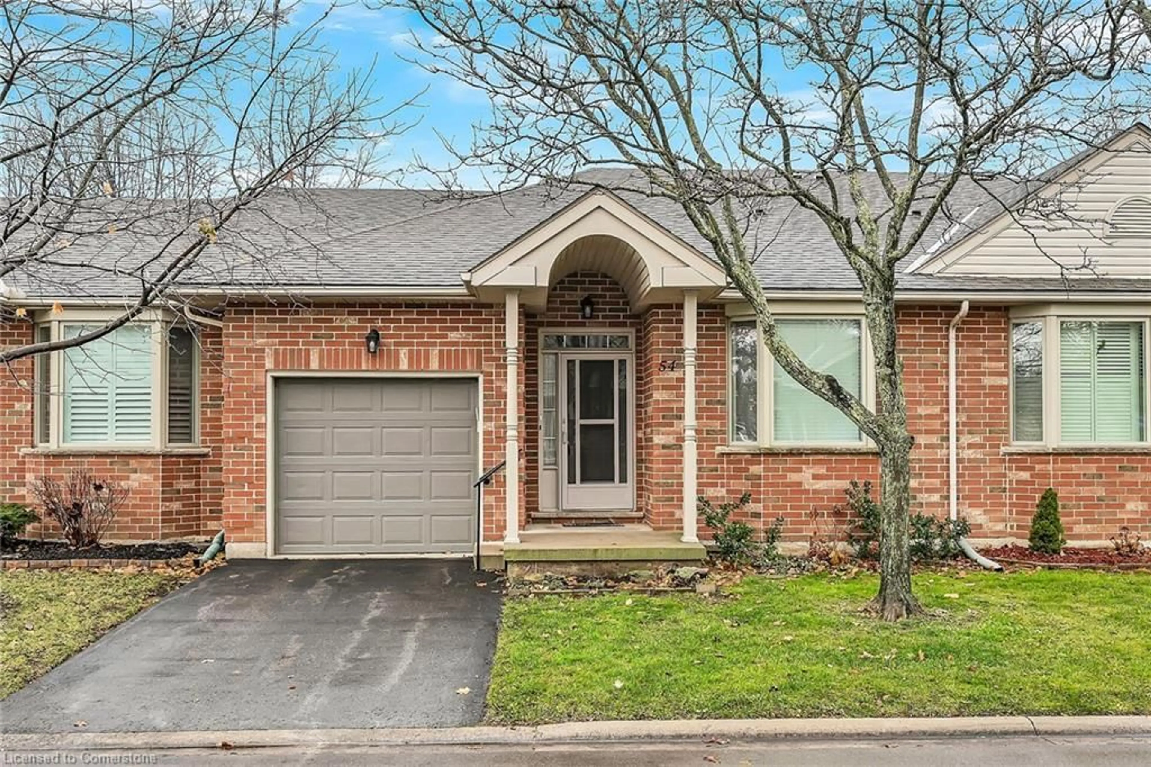 Home with brick exterior material, street for 54 Greentrail Dr, Mount Hope Ontario L0R 1W0