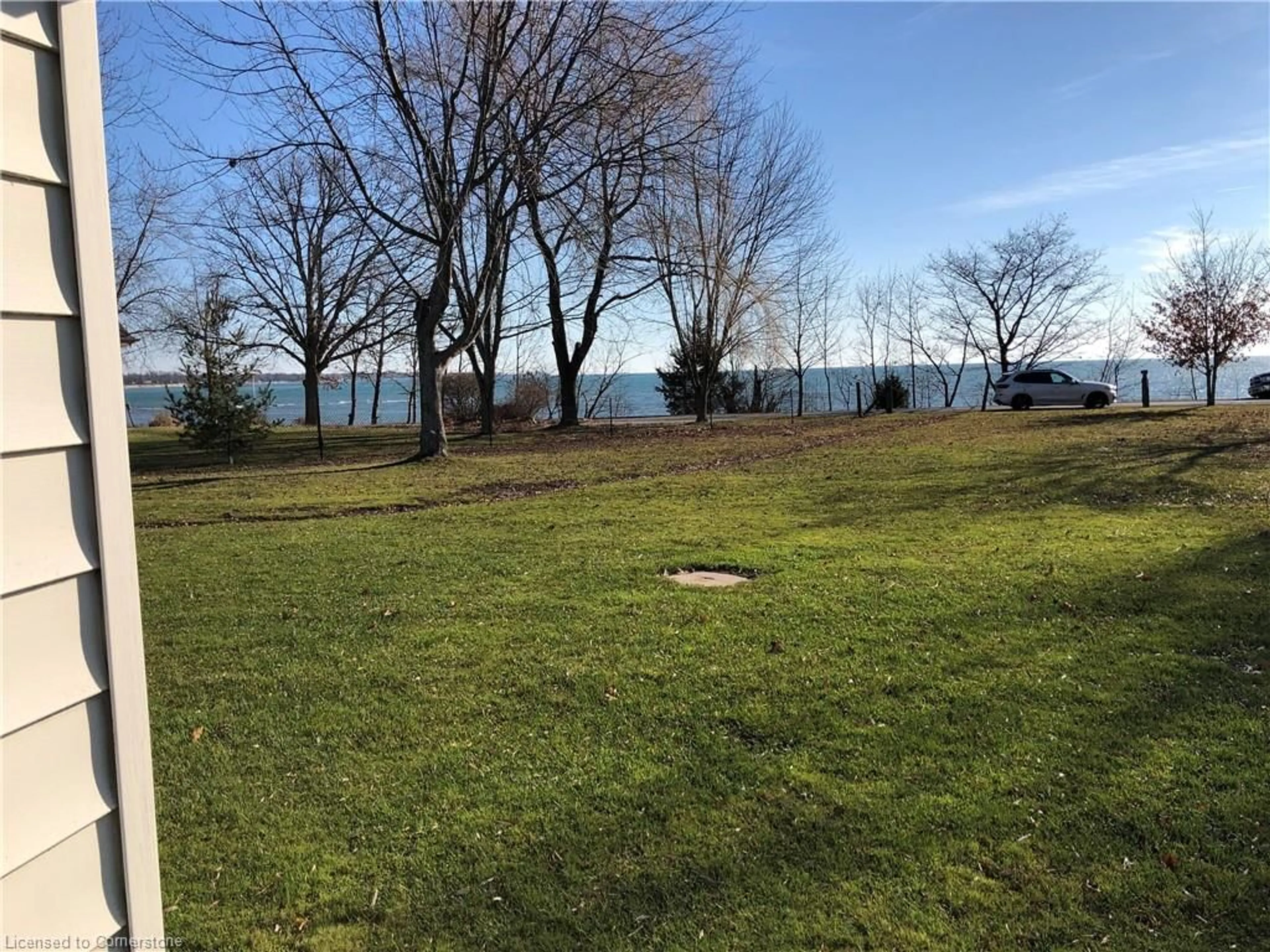 A pic from outside/outdoor area/front of a property/back of a property/a pic from drone, water/lake/river/ocean view for 2823 Lakeshore Rd, Dunnville Ontario N1A 2W8