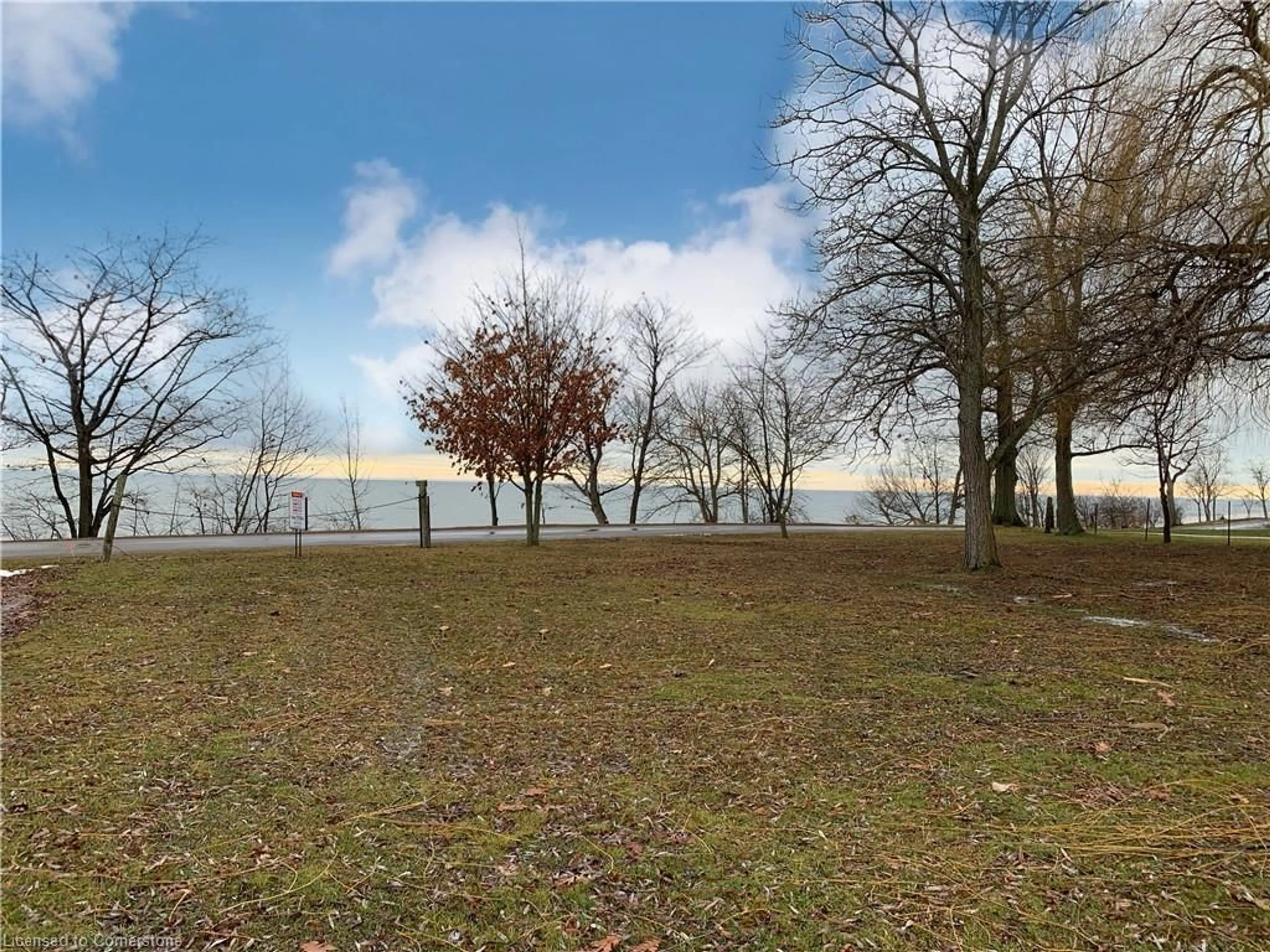 A pic from outside/outdoor area/front of a property/back of a property/a pic from drone, water/lake/river/ocean view for 2823 Lakeshore Rd, Dunnville Ontario N1A 2W8