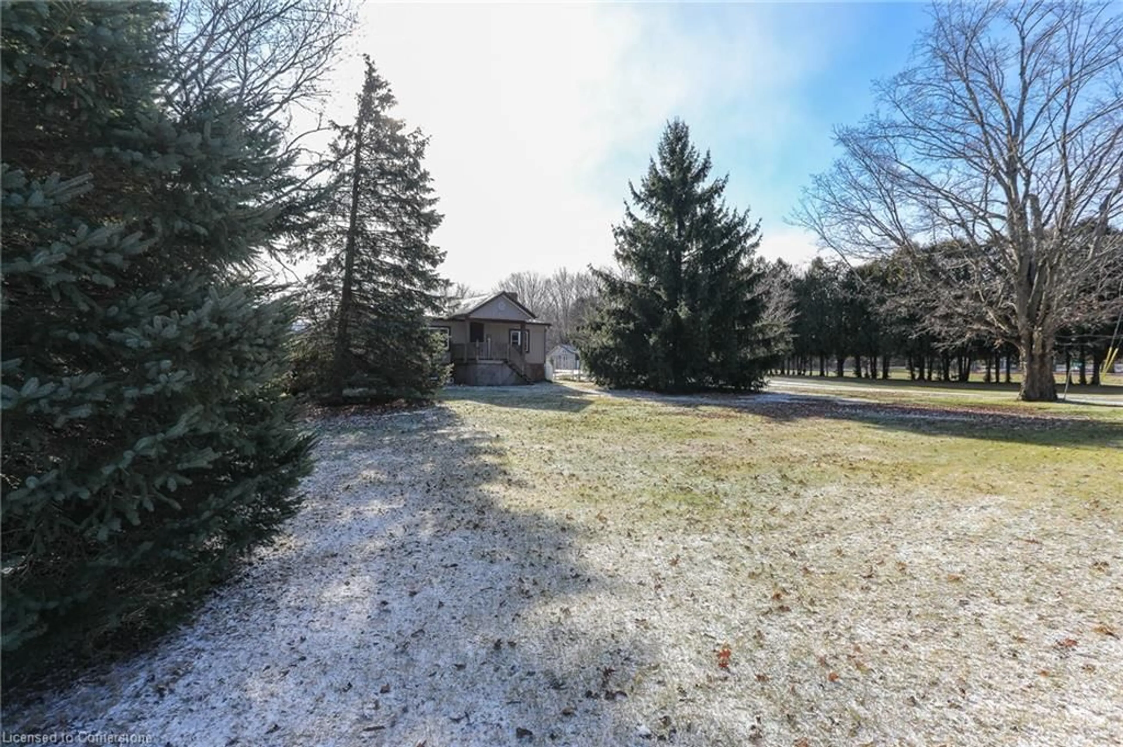 A pic from outside/outdoor area/front of a property/back of a property/a pic from drone, forest/trees view for 654 8th Concession Rd, Langton Ontario N0G 1G0