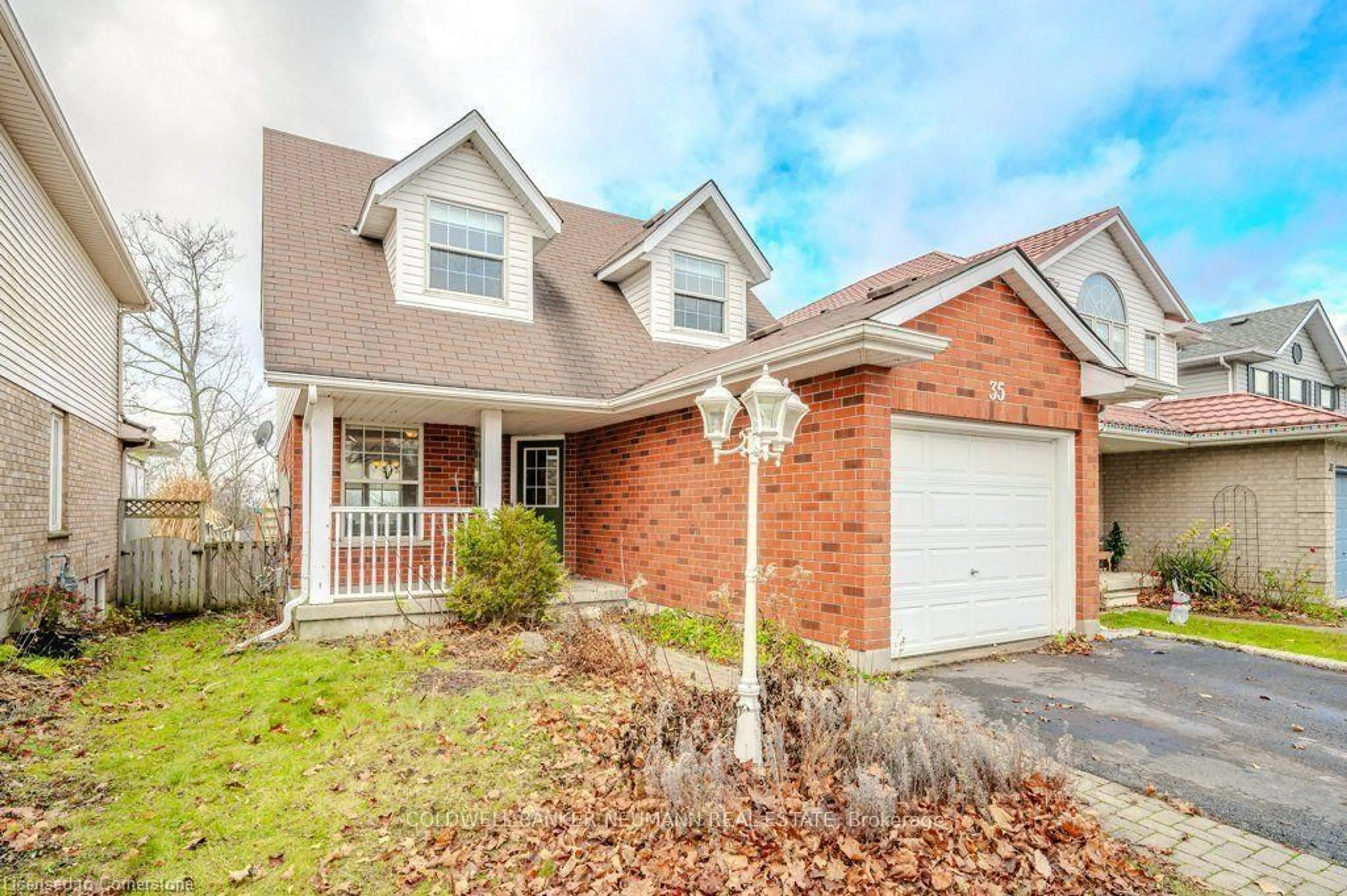 Home with brick exterior material, street for 35 Waxwing Cres, Guelph Ontario N1C 1E3