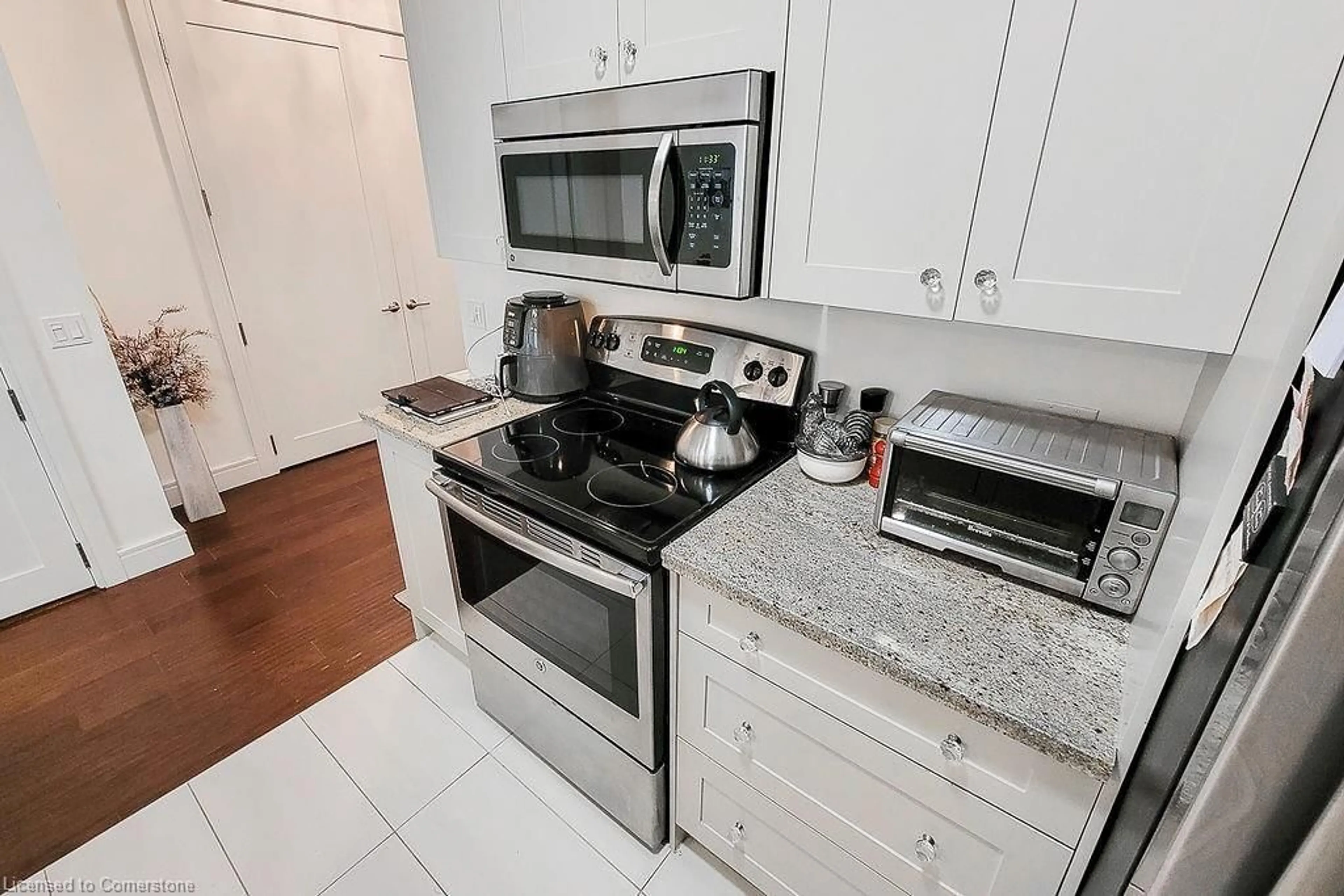 Standard kitchen, ceramic/tile floor for 112 King Street East St #410, Hamilton Ontario L8N 1A8