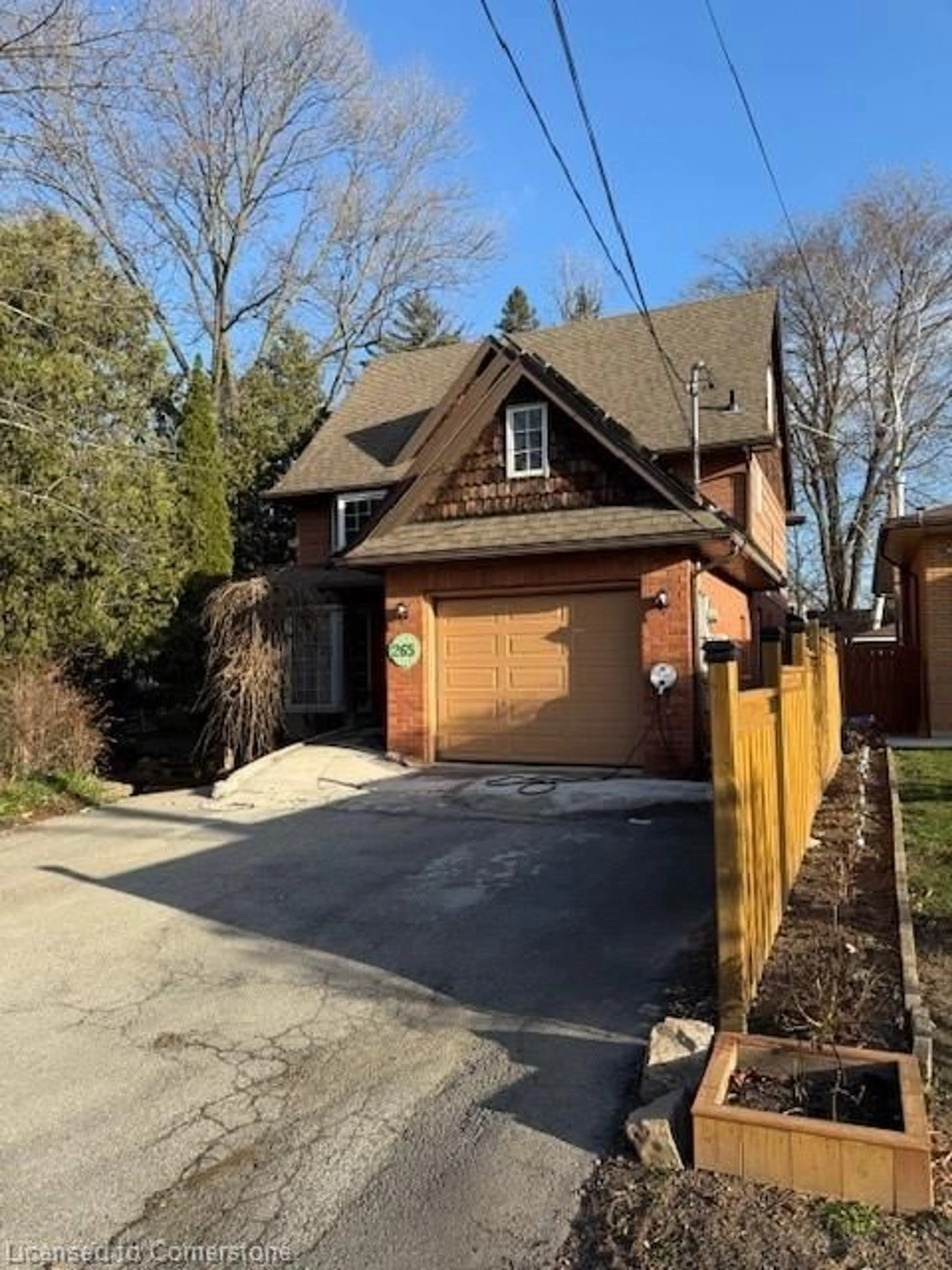 Home with brick exterior material, street for 265 Emerson St, Hamilton Ontario L8S 2Y5