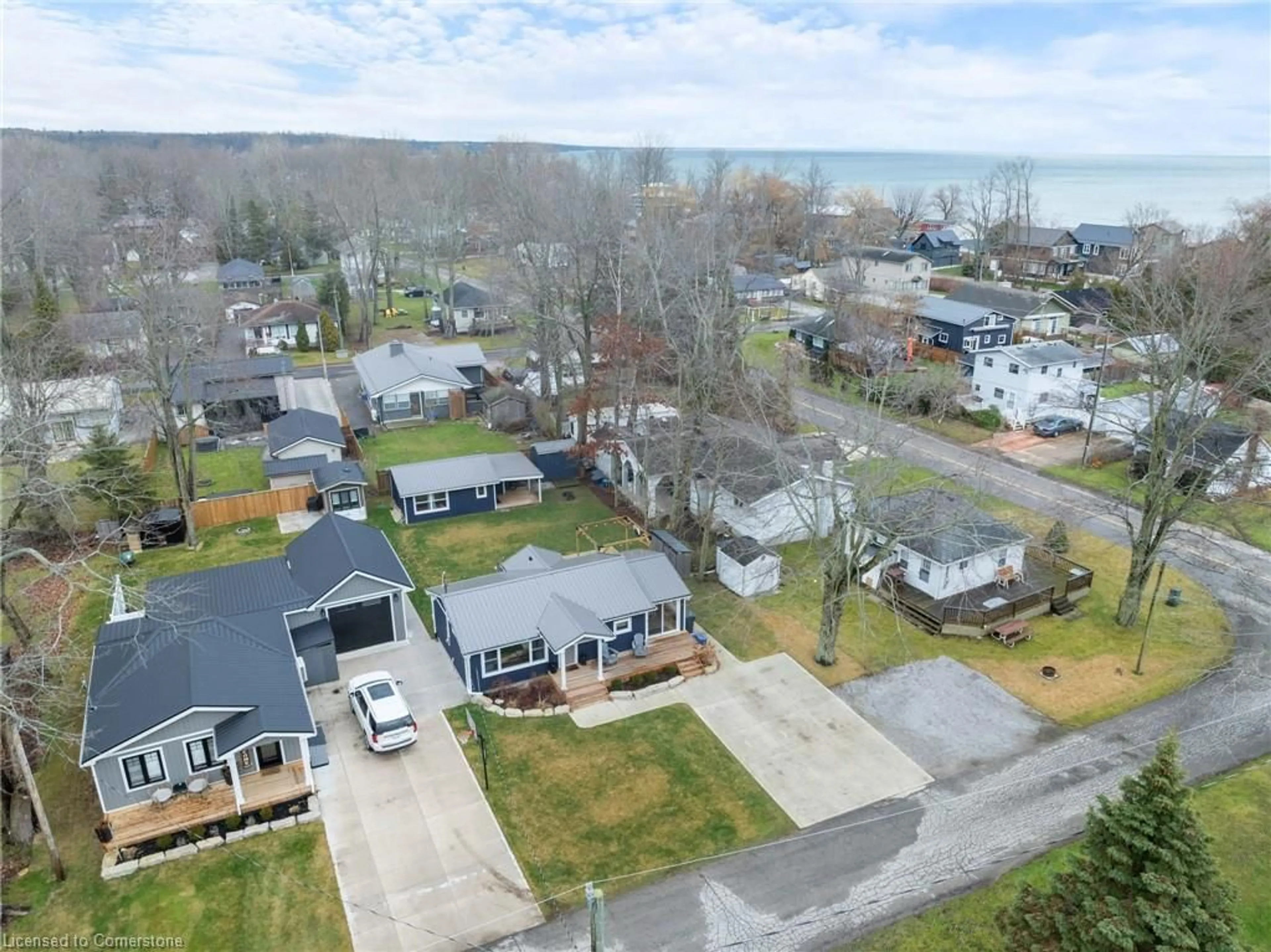 A pic from outside/outdoor area/front of a property/back of a property/a pic from drone, water/lake/river/ocean view for 11 Walmsley St, Turkey Point Ontario N0E 1T0