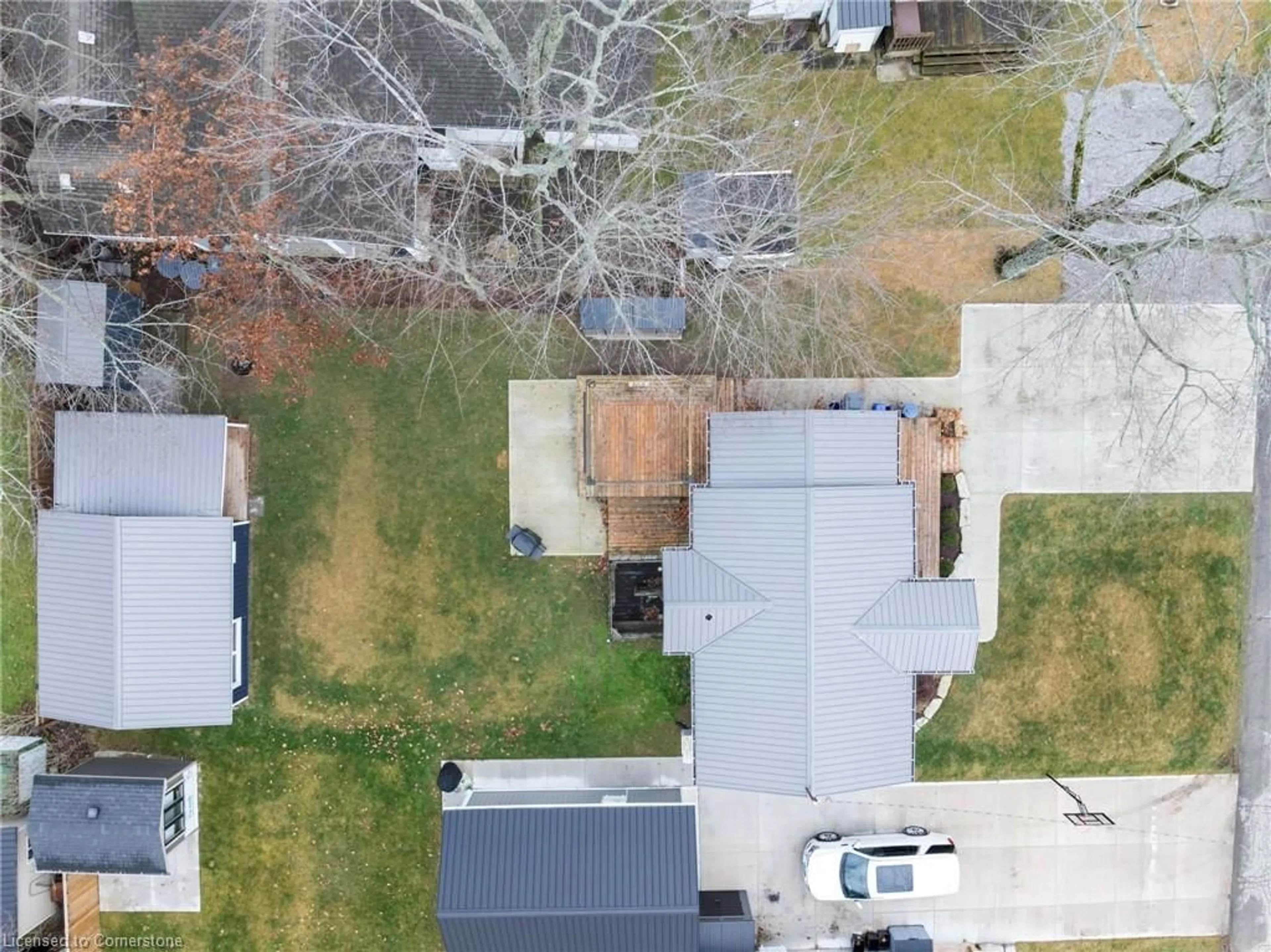 A pic from outside/outdoor area/front of a property/back of a property/a pic from drone, street for 11 Walmsley St, Turkey Point Ontario N0E 1T0