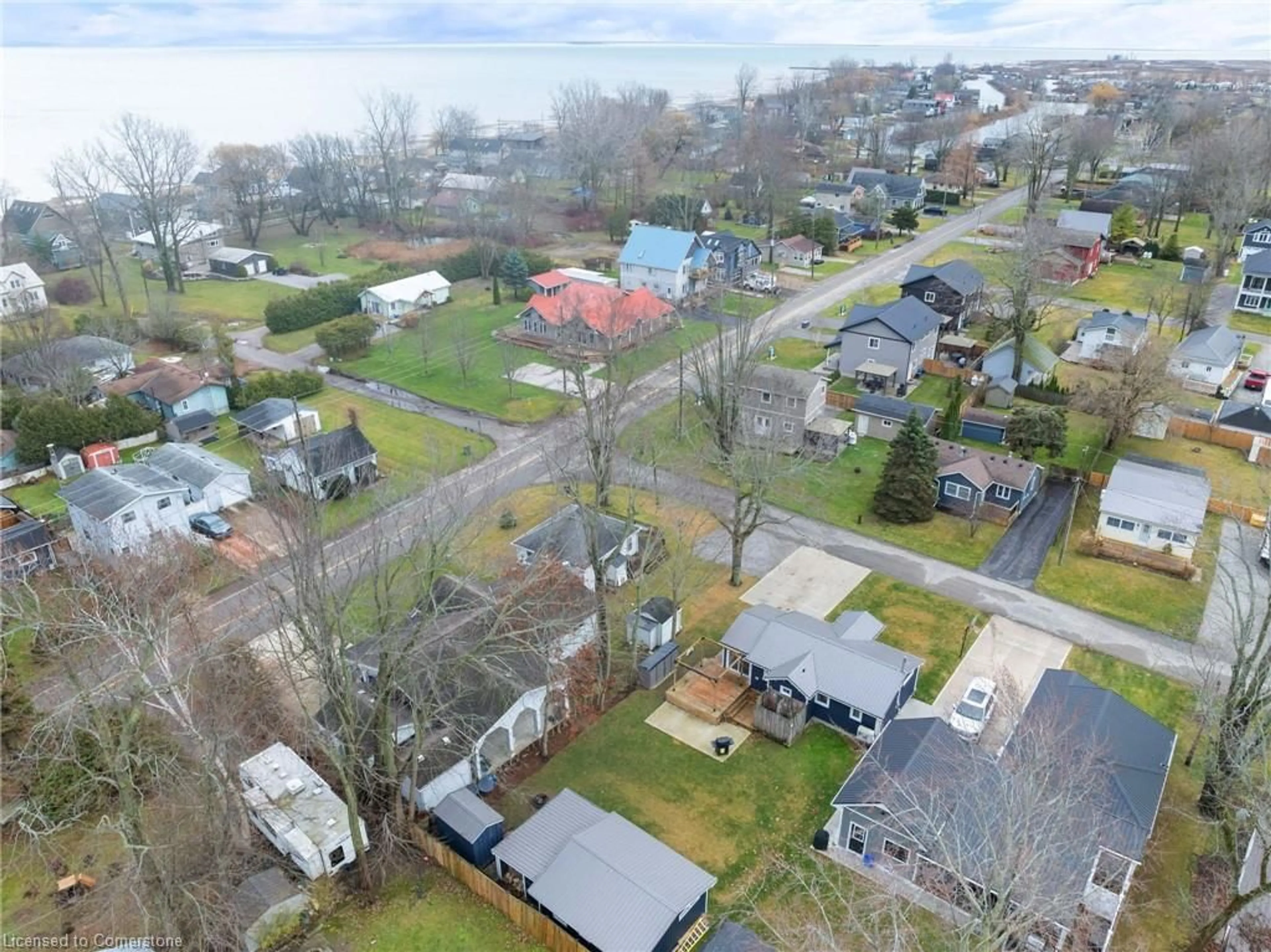 A pic from outside/outdoor area/front of a property/back of a property/a pic from drone, street for 11 Walmsley St, Turkey Point Ontario N0E 1T0