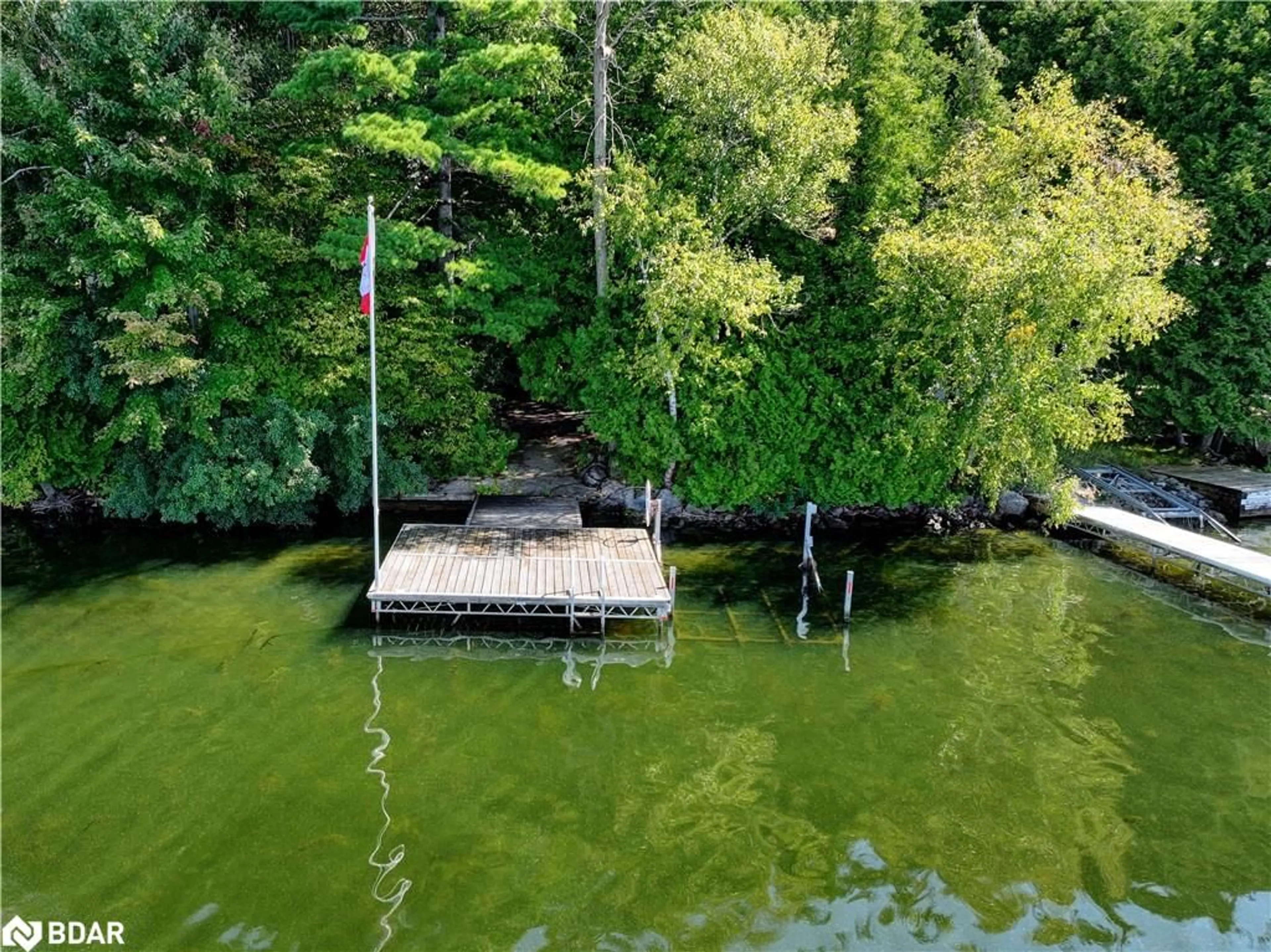 A pic from outside/outdoor area/front of a property/back of a property/a pic from drone, water/lake/river/ocean view for 127 Sugarbush Cres, Lakehurst Ontario K0L 1J0