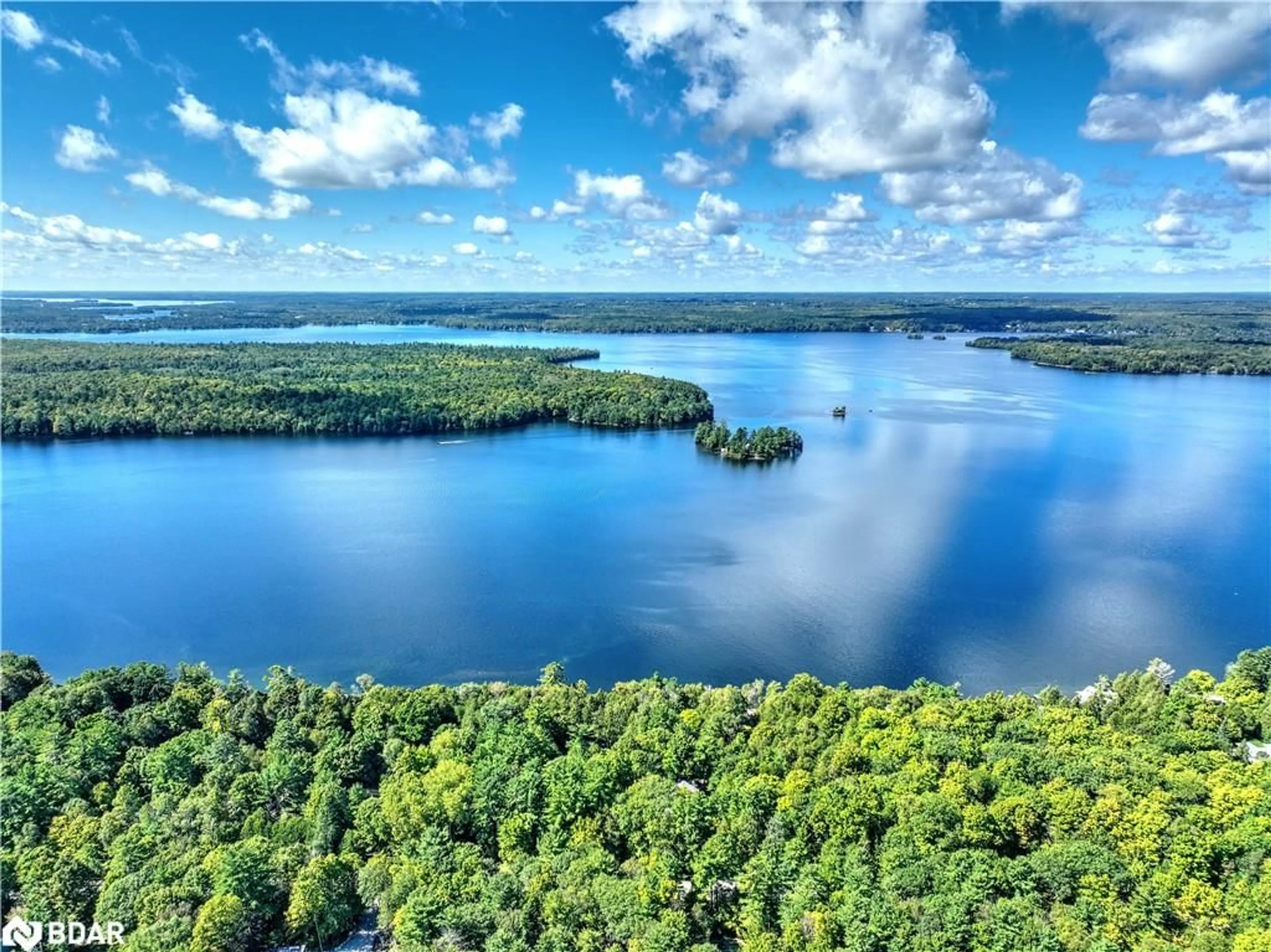 A pic from outside/outdoor area/front of a property/back of a property/a pic from drone, water/lake/river/ocean view for 127 Sugarbush Cres, Lakehurst Ontario K0L 1J0