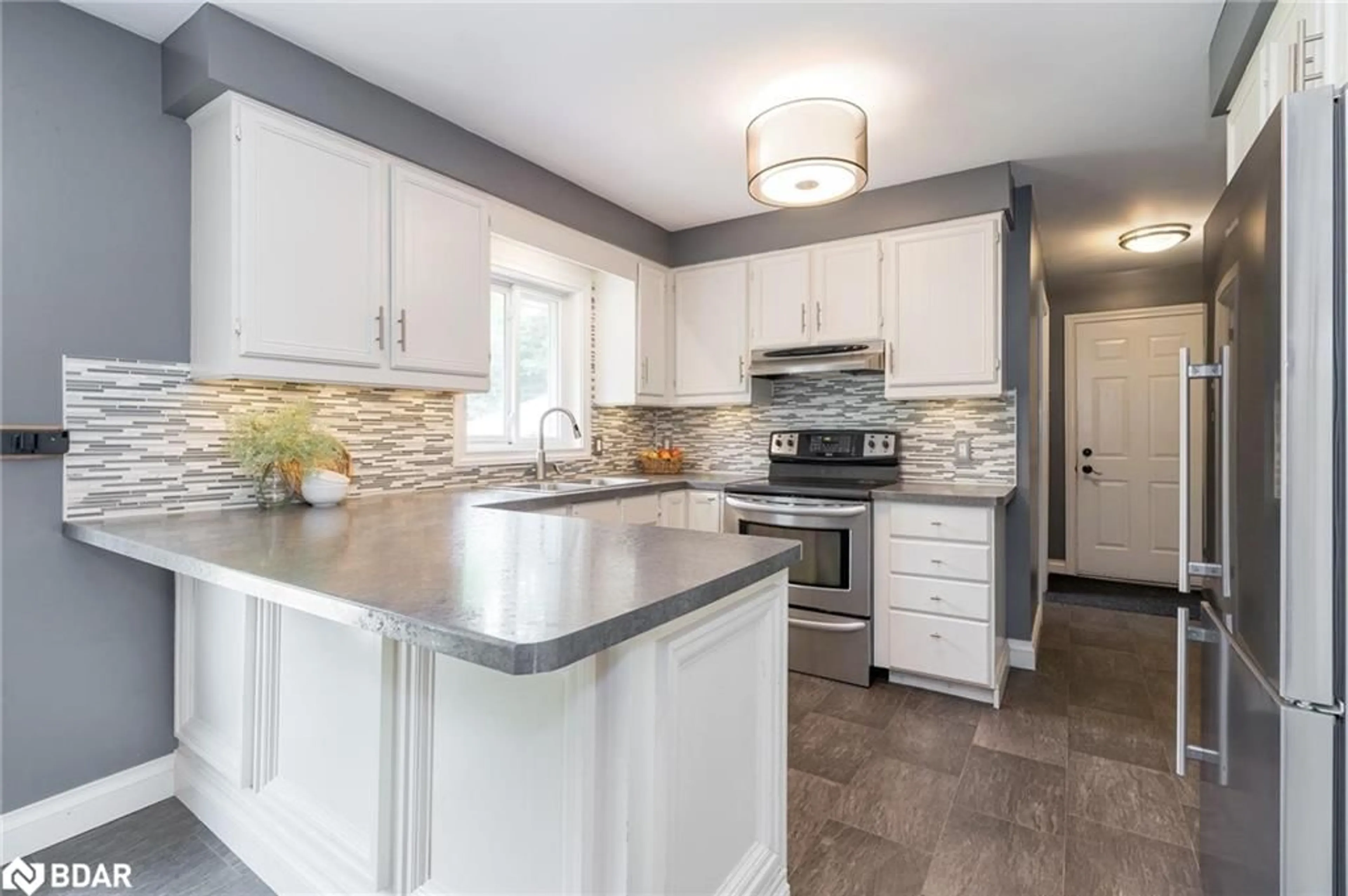 Open concept kitchen, unknown for 220 Moonstone Rd, Moonstone Ontario L0K 1N0