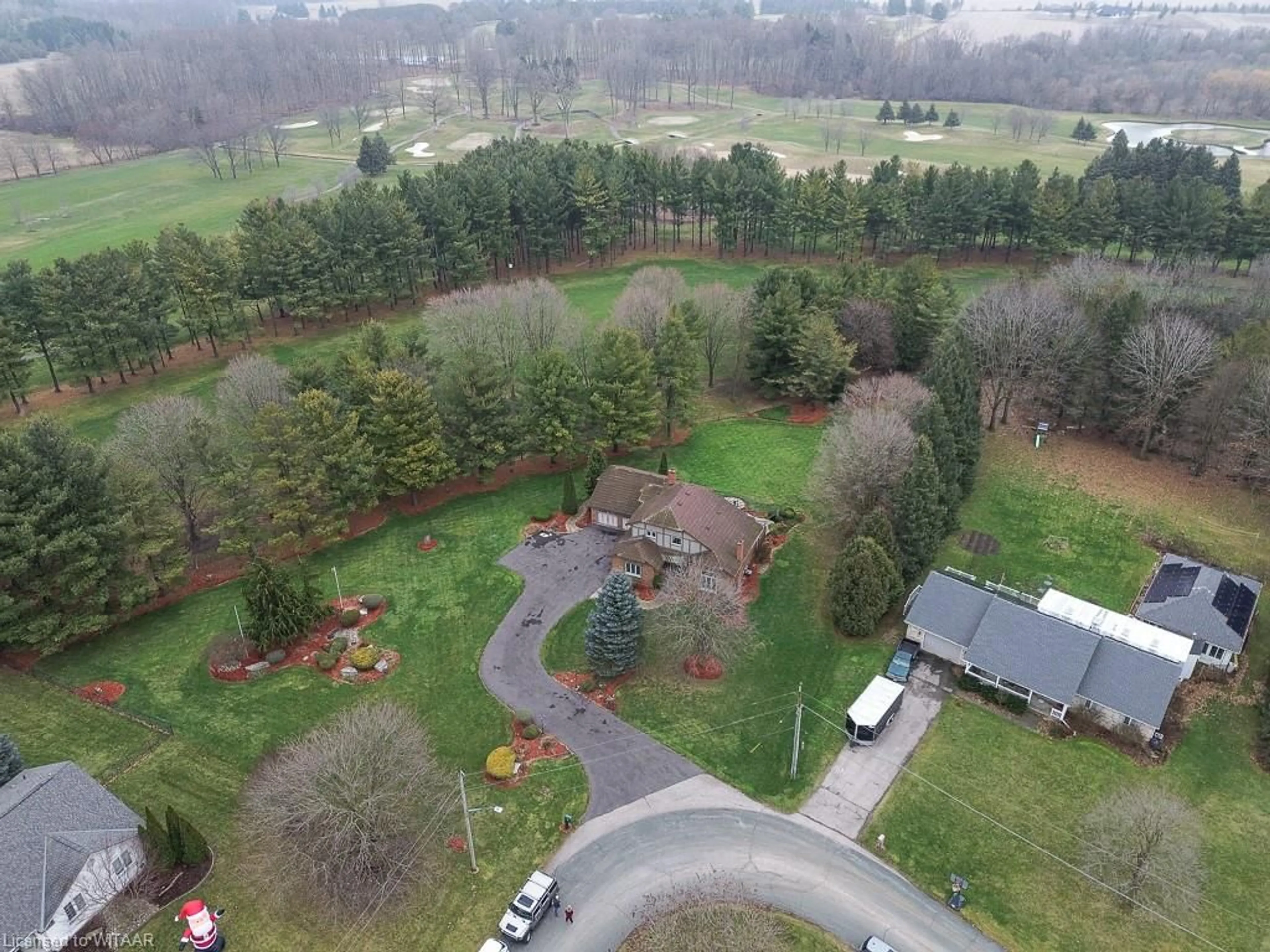 A pic from outside/outdoor area/front of a property/back of a property/a pic from drone, forest/trees view for 49 Elisabeth St, Innerkip Ontario N0J 1M0