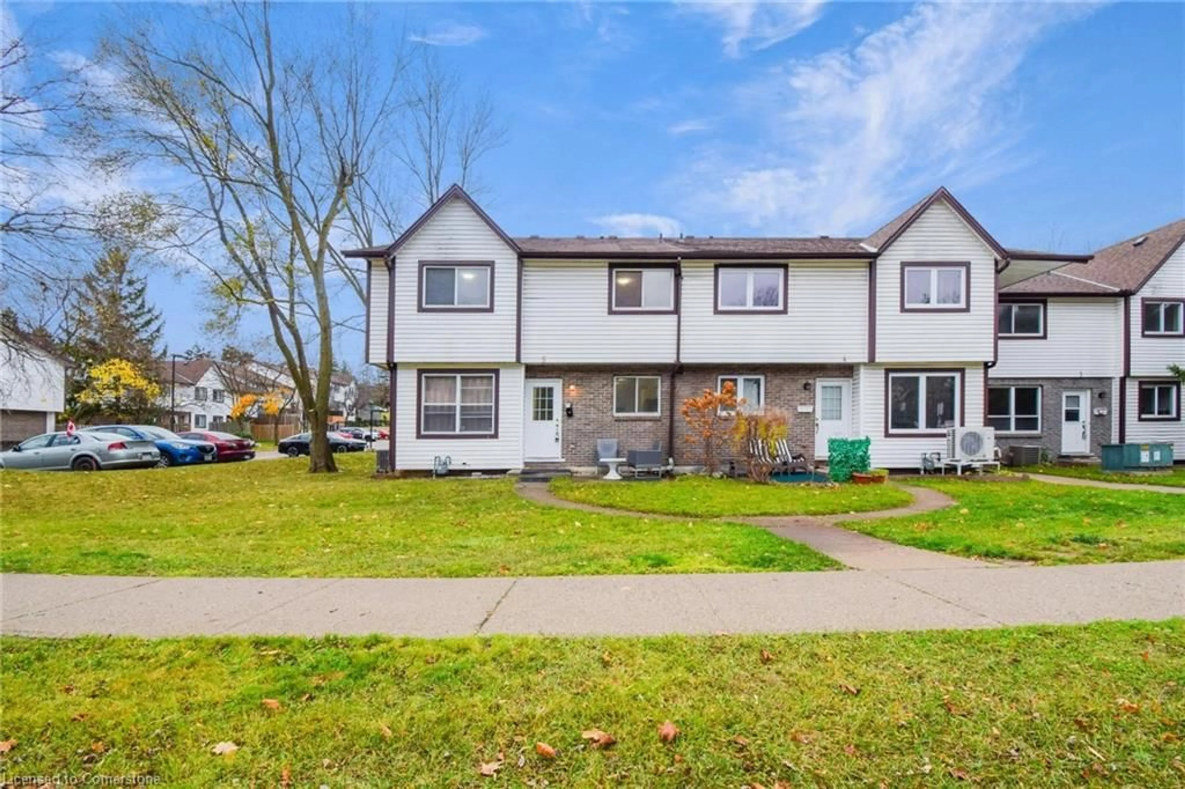 Home with vinyl exterior material, street for 445 Pioneer Dr #5, Kitchener Ontario N2P 1L8