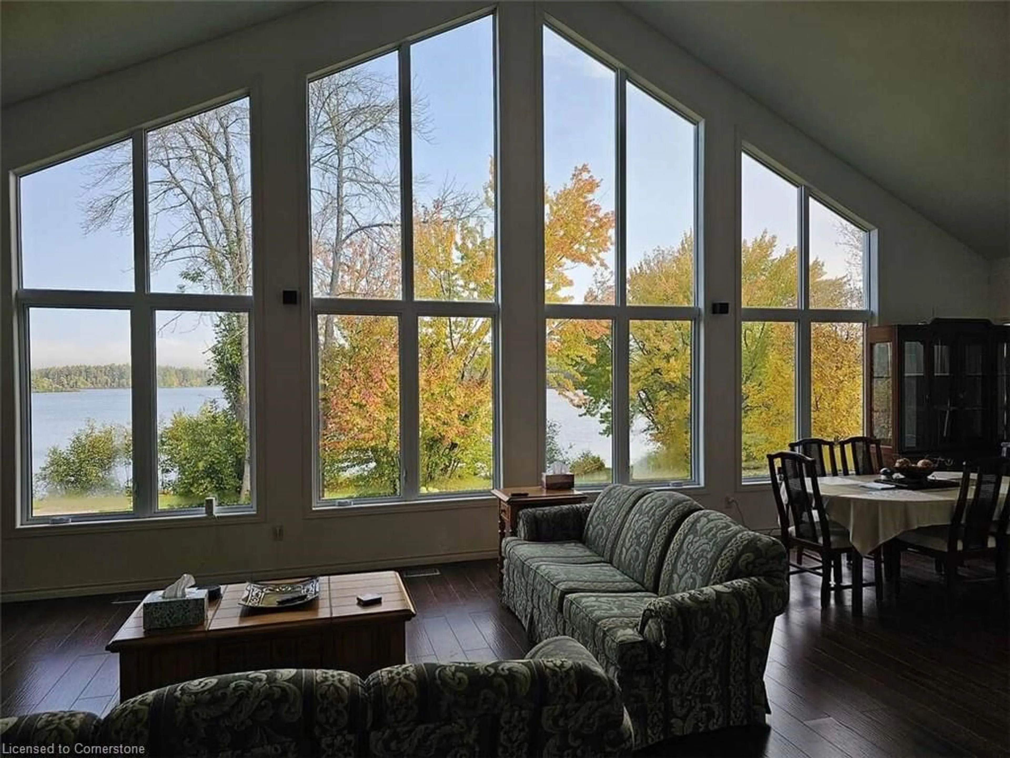 Living room with furniture, wood/laminate floor for 166A Talon Lake Rd, Rutherglen Ontario P0H 2E0