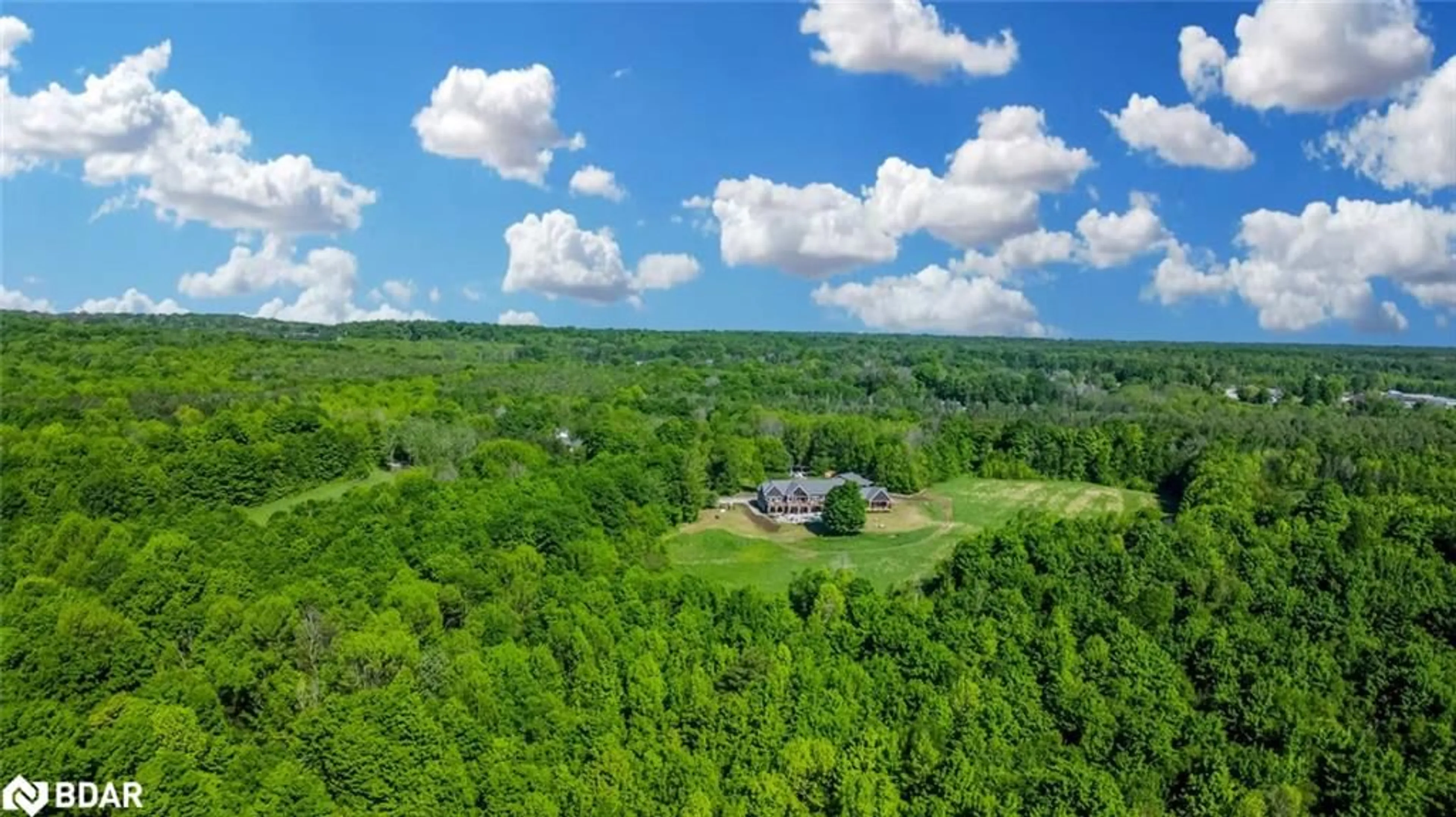 A pic from outside/outdoor area/front of a property/back of a property/a pic from drone, forest/trees view for 5385 Line 8 North, Moonstone Ontario L0K 1N0