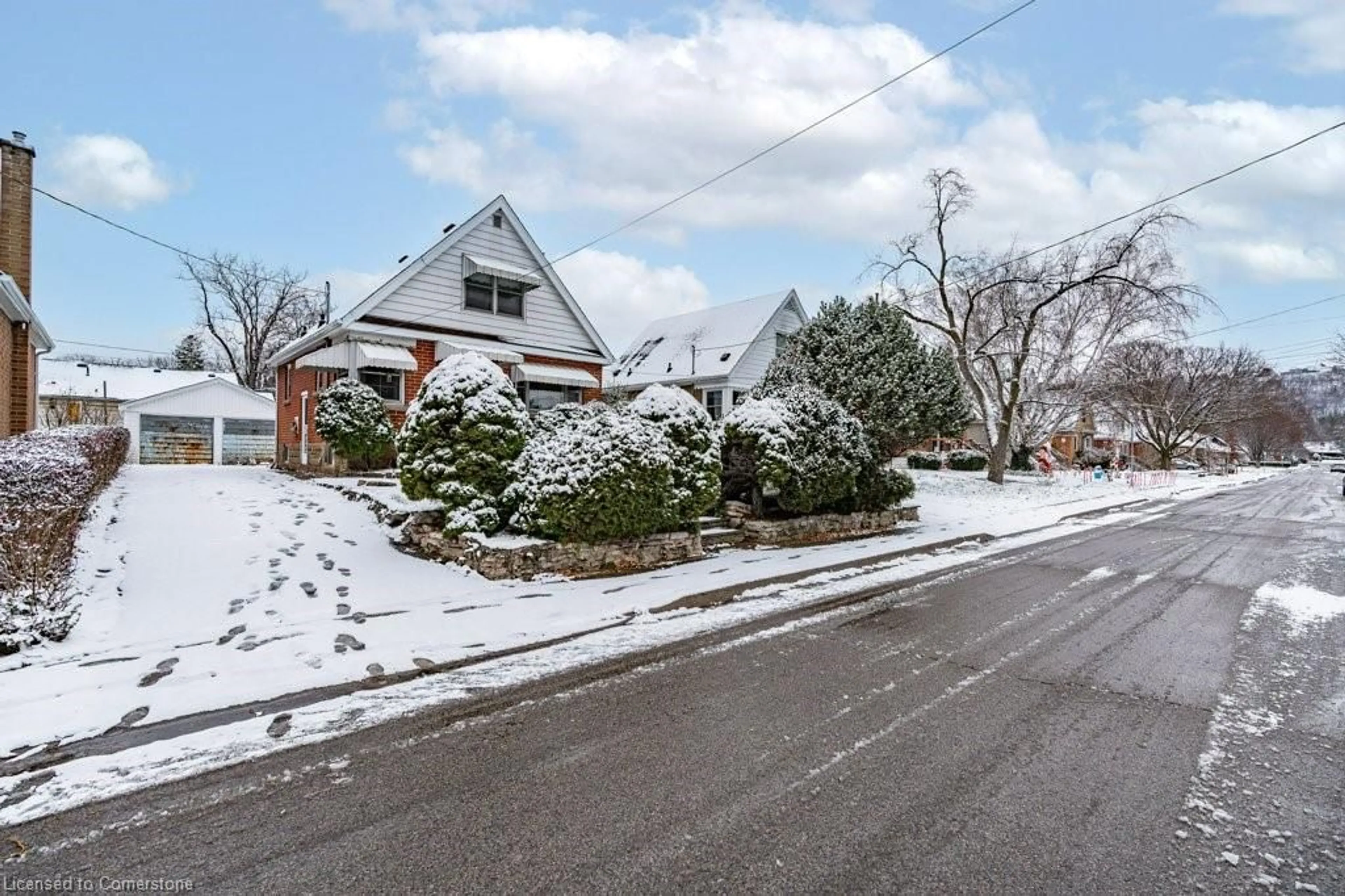 A pic from outside/outdoor area/front of a property/back of a property/a pic from drone, street for 1A Cameron Ave, Hamilton Ontario L9H 1P4