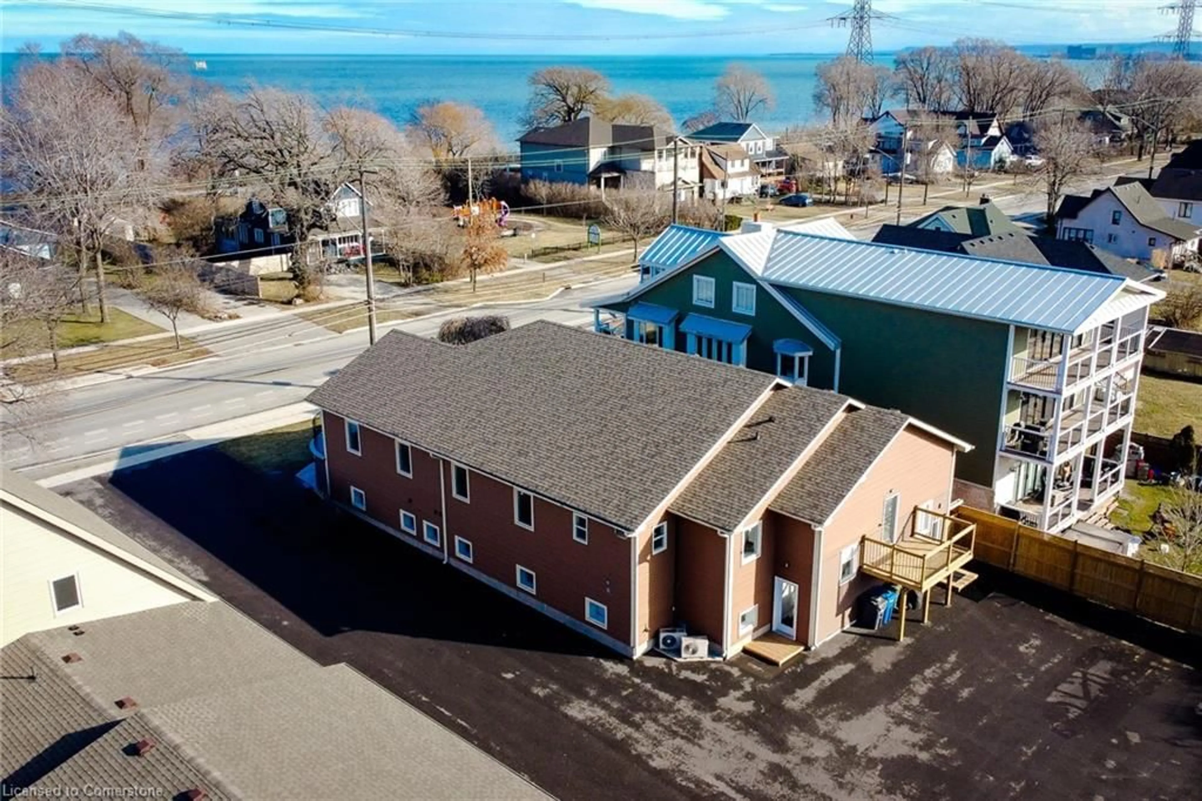 A pic from outside/outdoor area/front of a property/back of a property/a pic from drone, water/lake/river/ocean view for 180 Beach Blvd, Hamilton Ontario L8H 6V9