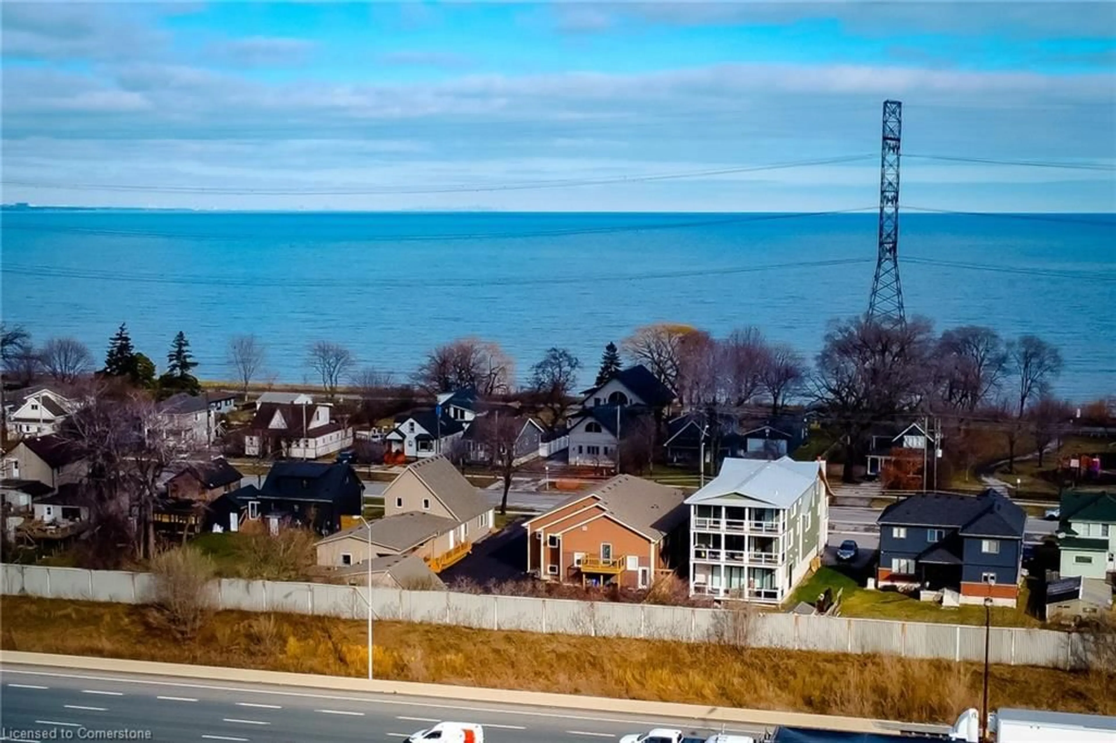 A pic from outside/outdoor area/front of a property/back of a property/a pic from drone, water/lake/river/ocean view for 180 Beach Blvd, Hamilton Ontario L8H 6V9