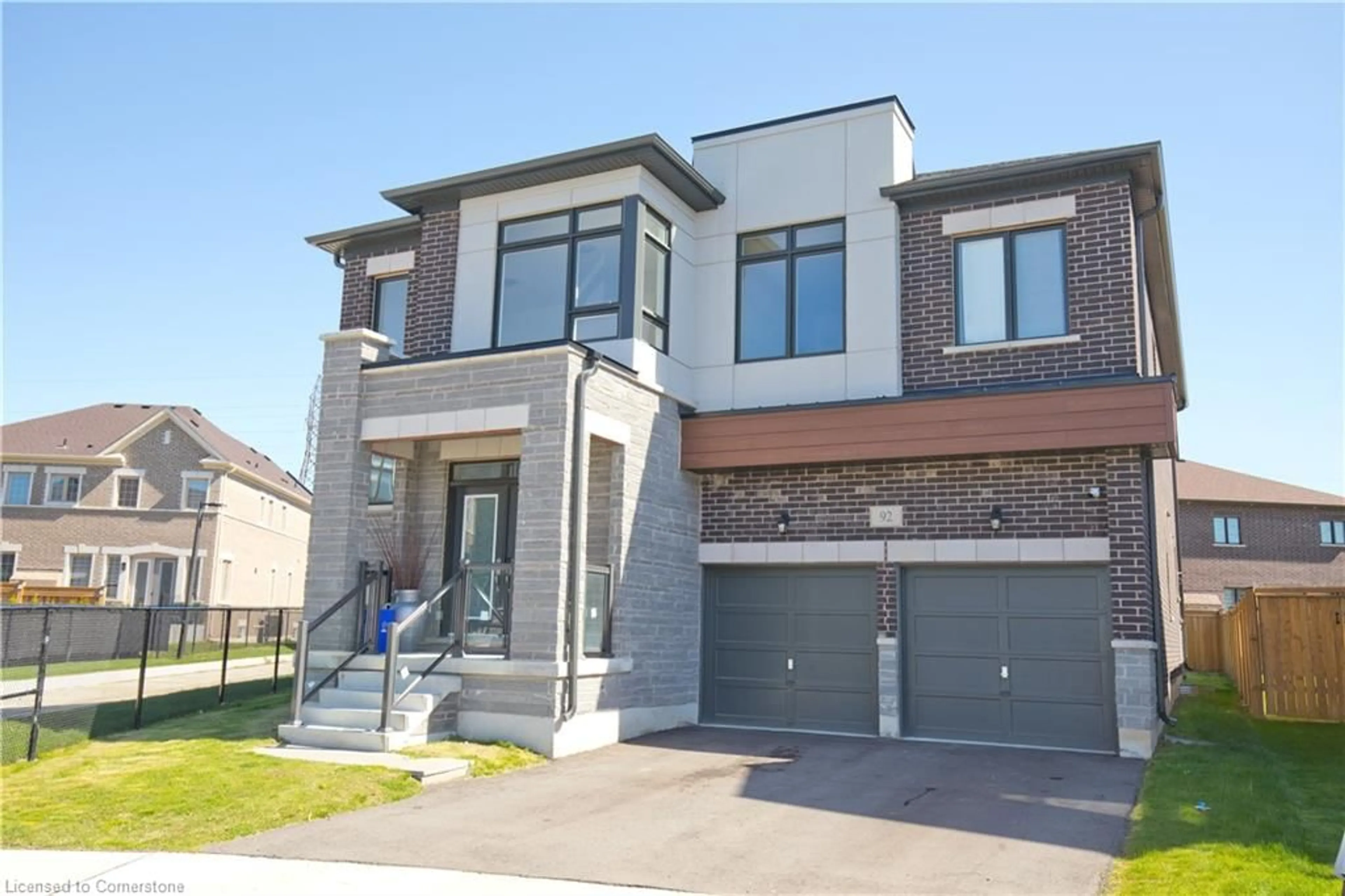 Home with brick exterior material, street for 92 Elstone Place, Waterdown Ontario L8B 1Y9