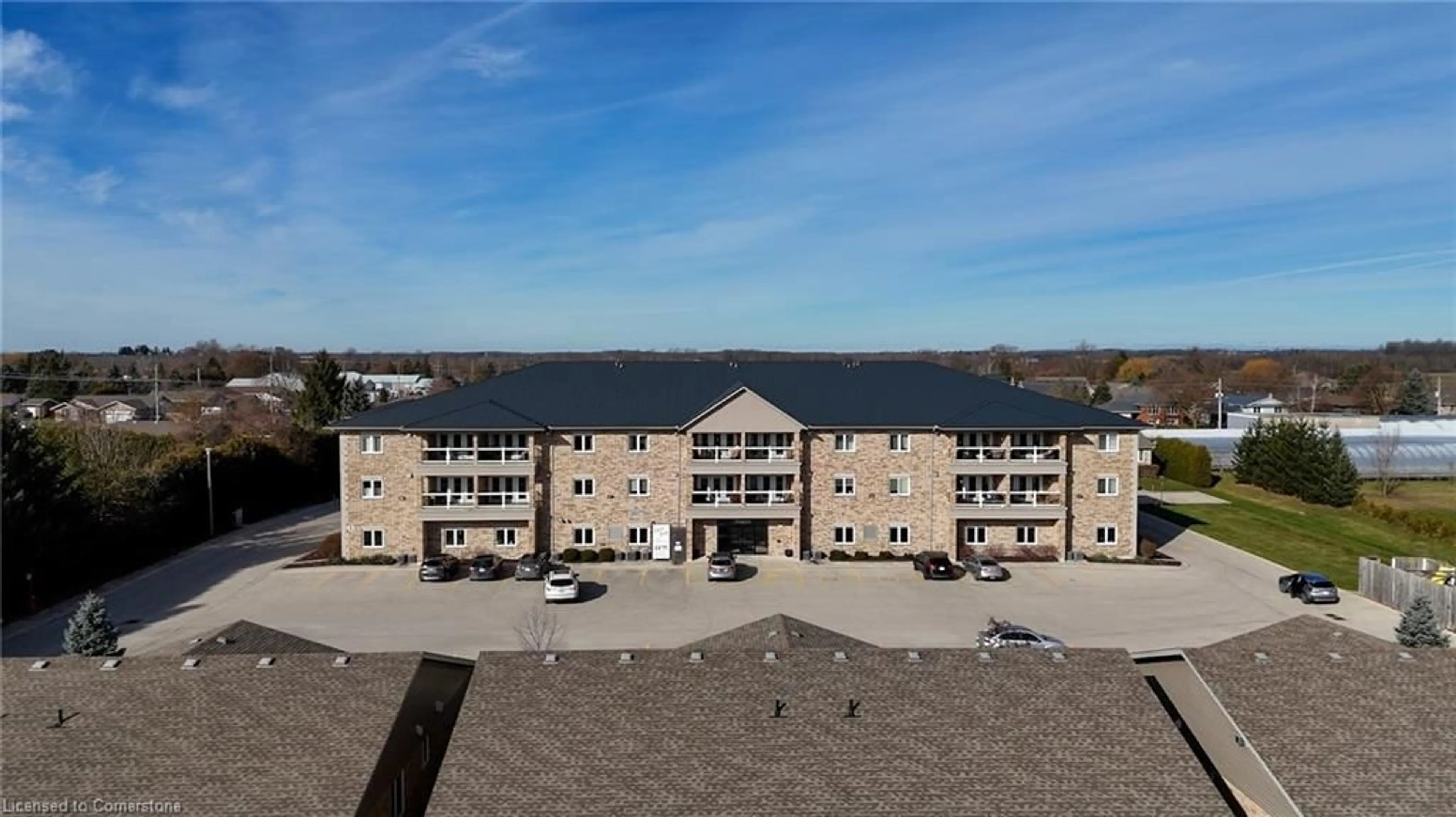 A pic from outside/outdoor area/front of a property/back of a property/a pic from drone, building for 401 Birmingham St #301, Mount Forest Ontario N0G 2L2