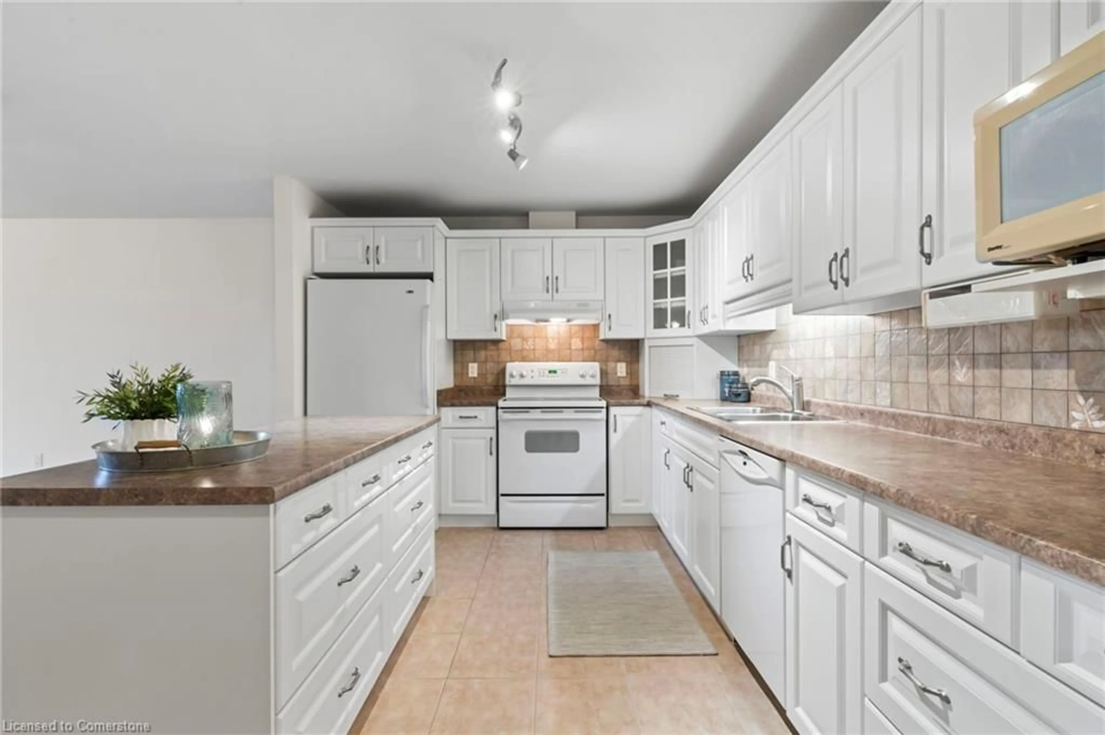 Standard kitchen, ceramic/tile floor for 401 Birmingham St #301, Mount Forest Ontario N0G 2L2