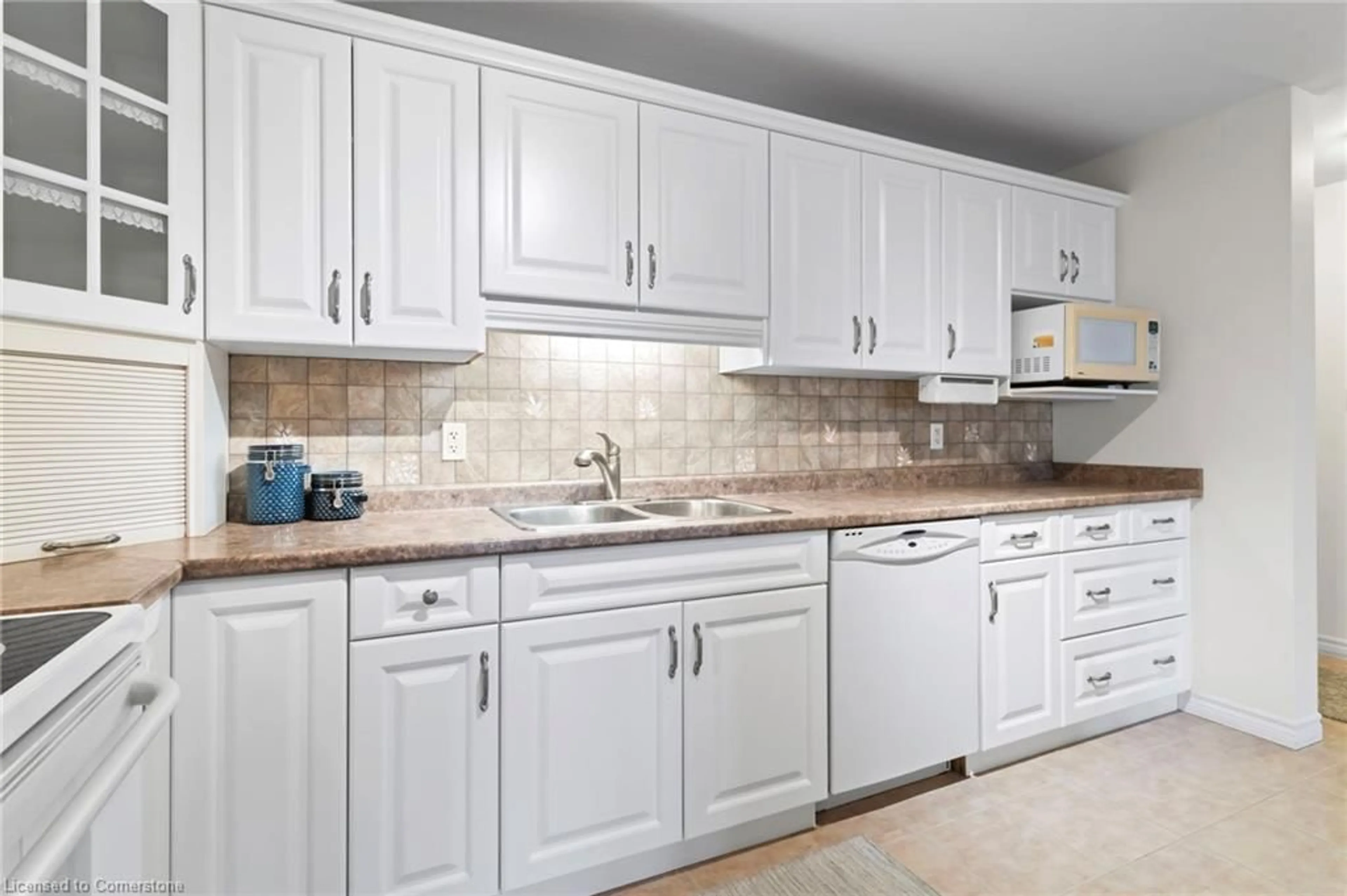 Standard kitchen, ceramic/tile floor for 401 Birmingham St #301, Mount Forest Ontario N0G 2L2