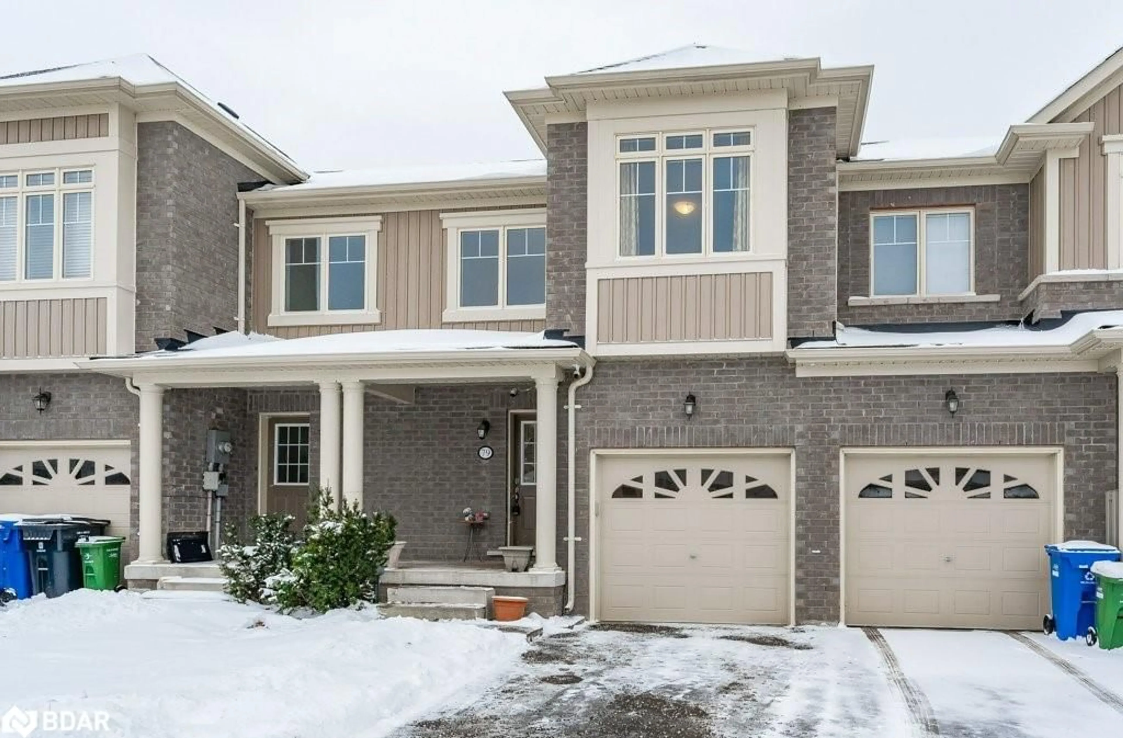 Home with brick exterior material, street for 79 Pettitt Drive Dr, Guelph Ontario N1E 0M2