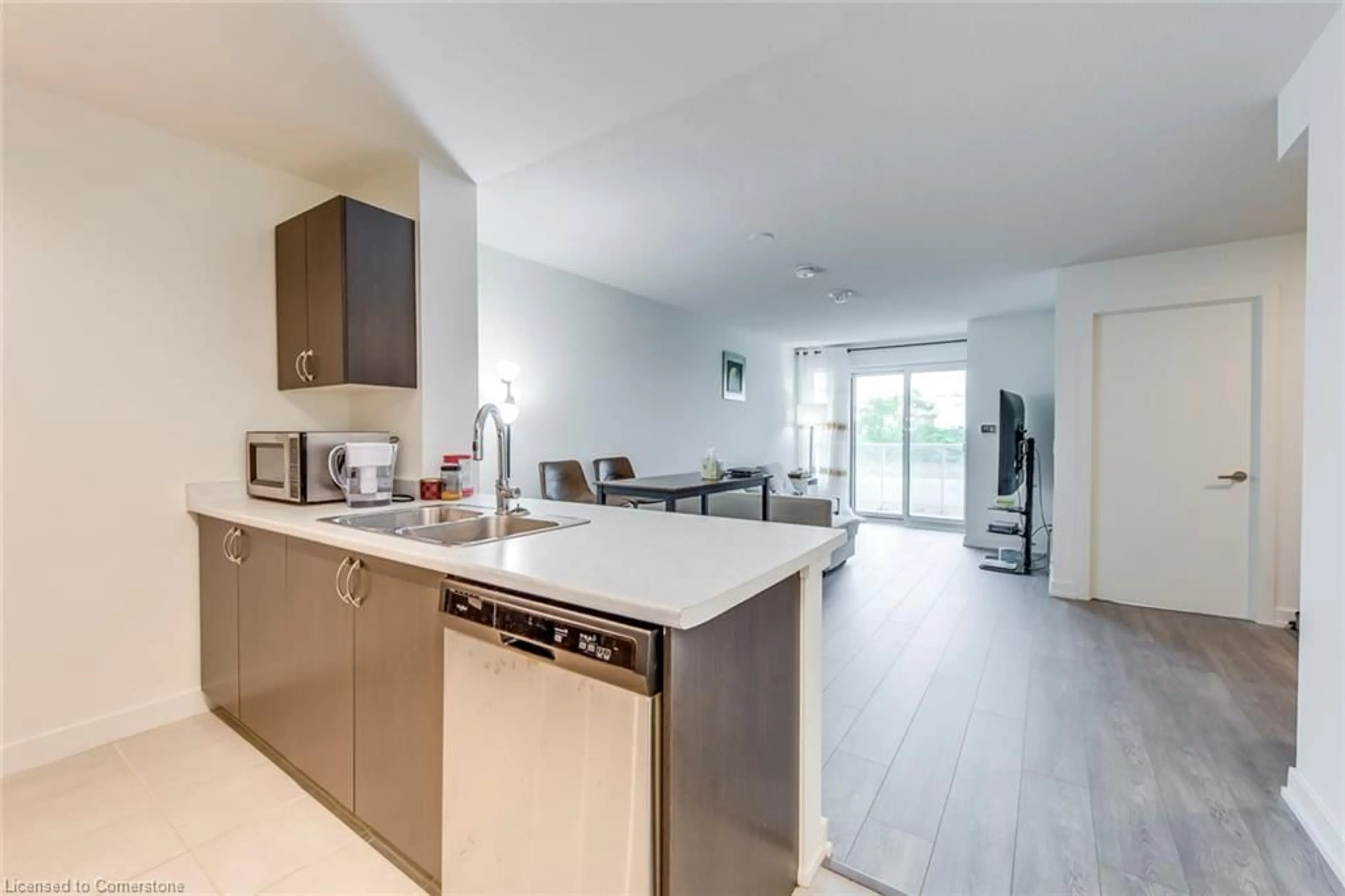 Open concept kitchen, unknown for 10 Wilby Cres #309, Toronto Ontario M6N 0B6