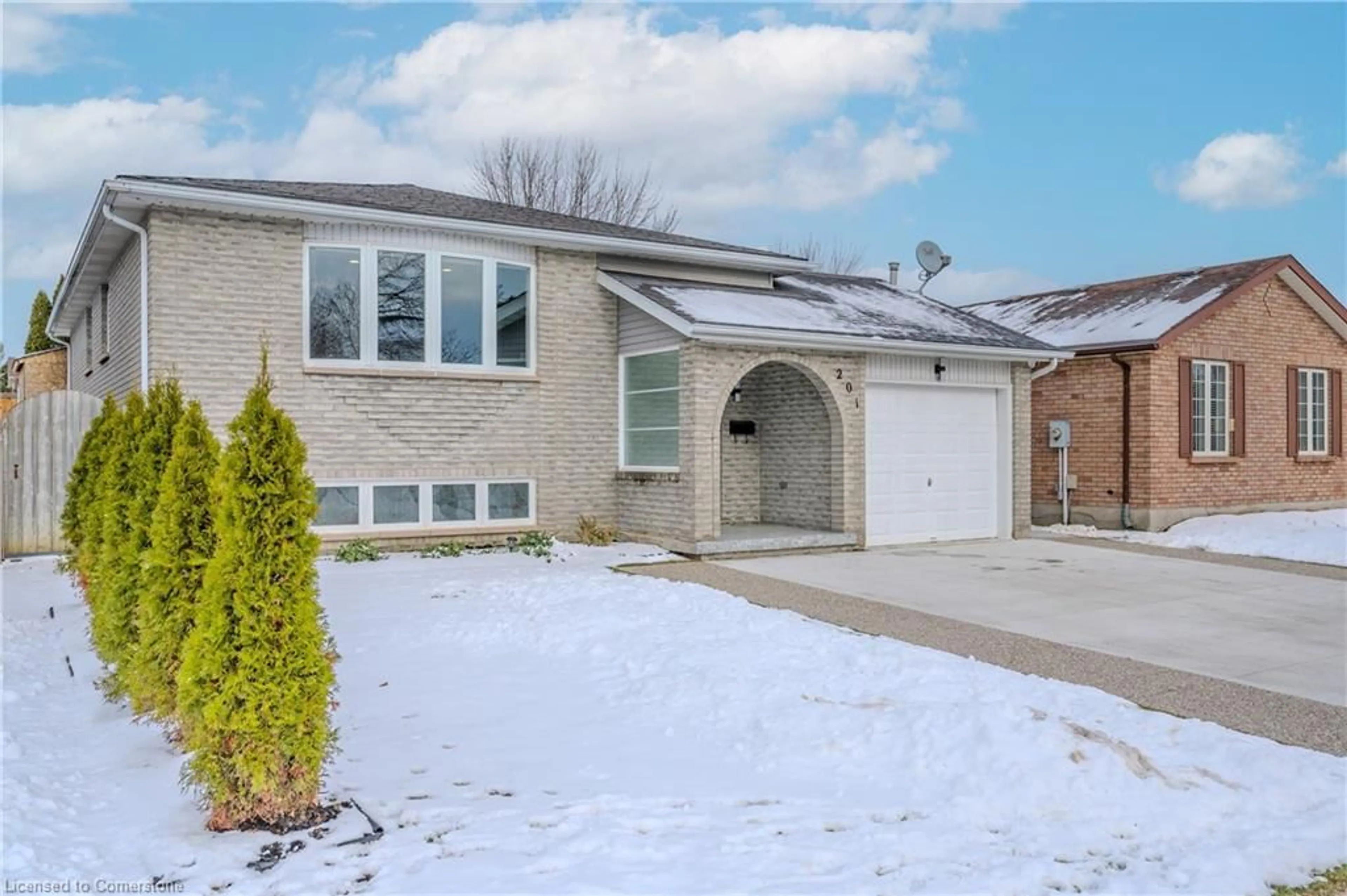 Home with brick exterior material, street for 201 Erinbrook Dr, Kitchener Ontario N2E 3K5