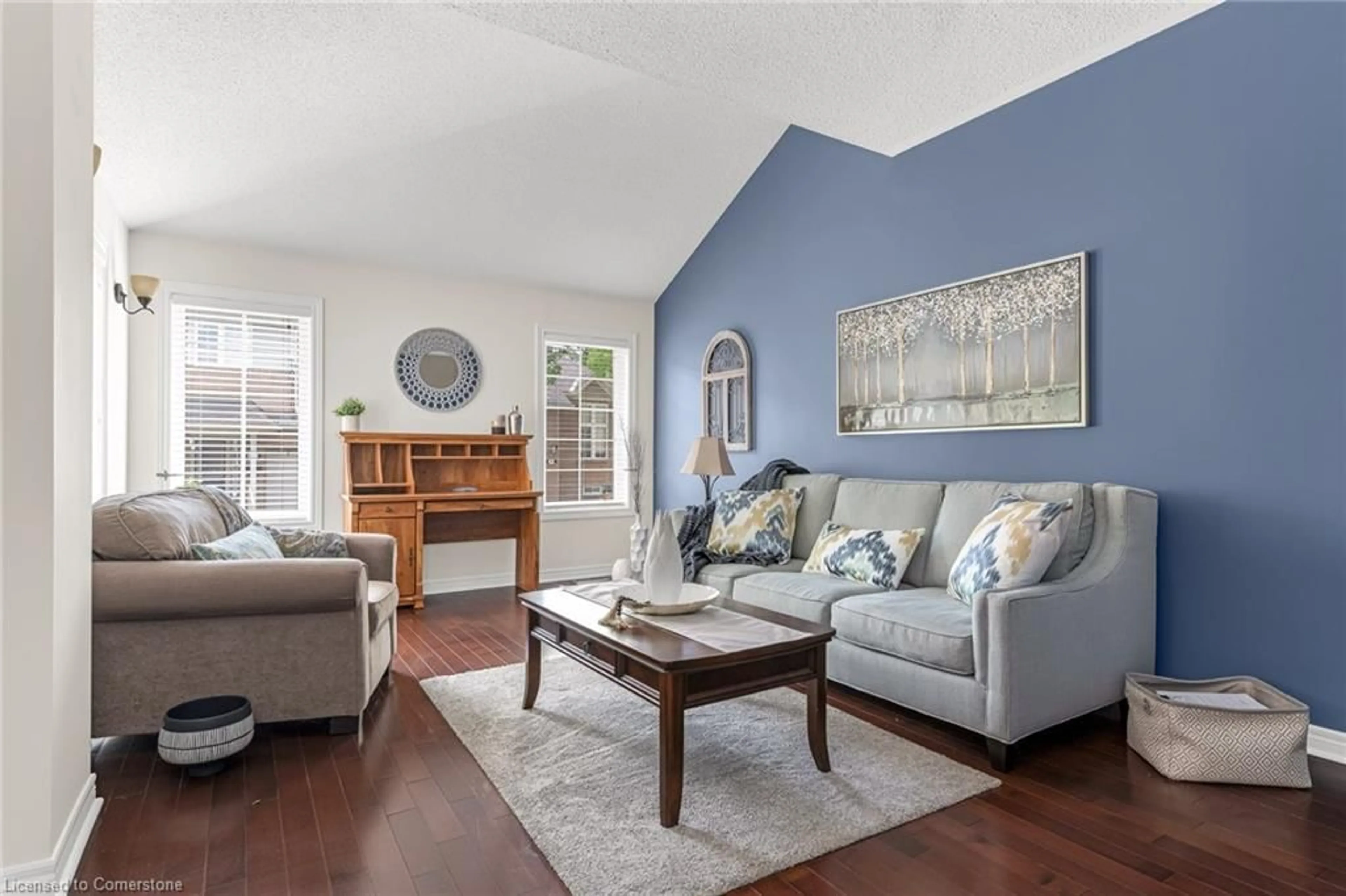 Living room with furniture, wood/laminate floor for 100 Beddoe Dr #6, Hamilton Ontario L8P 4Z2