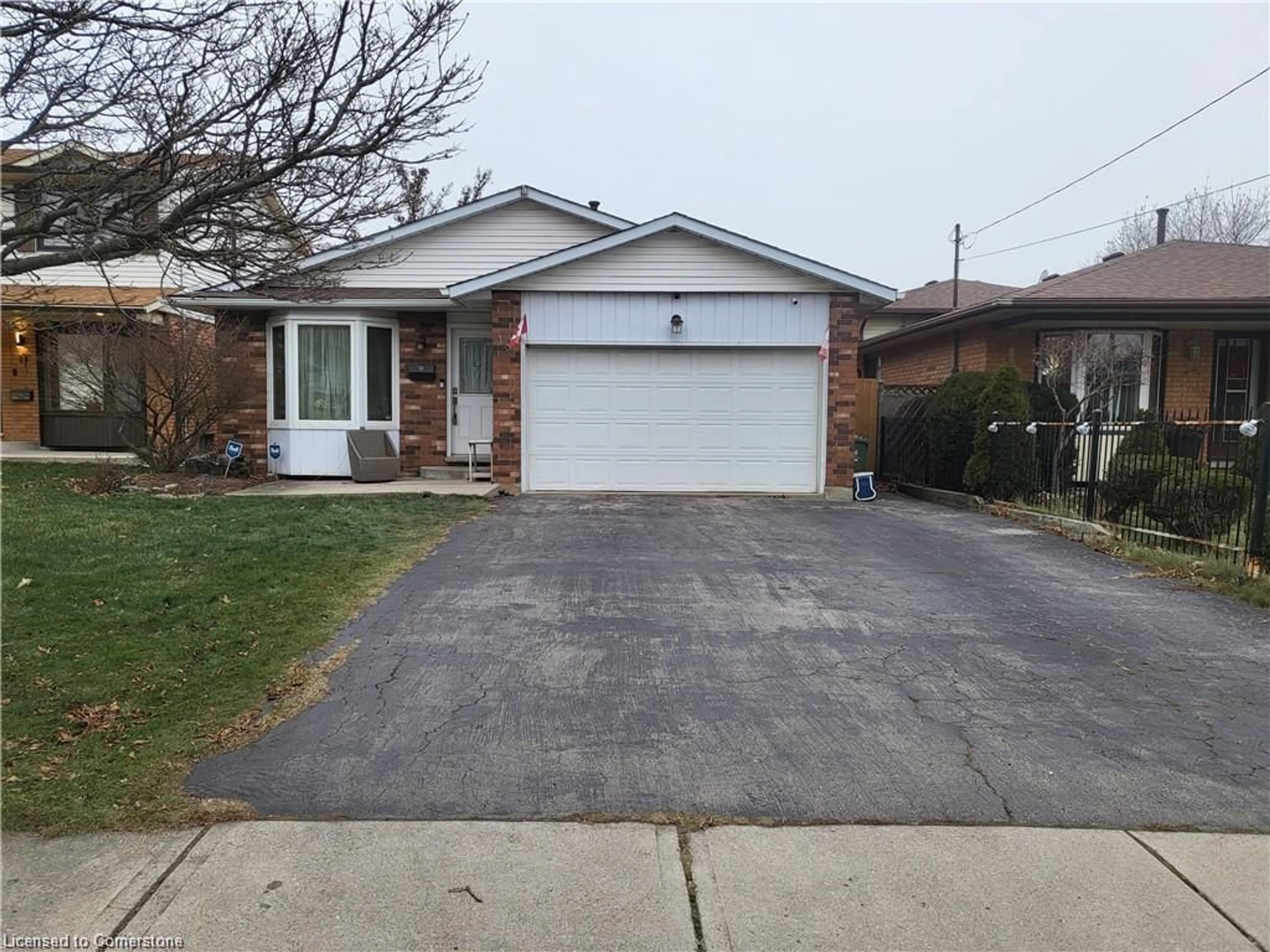 Home with brick exterior material, street for 18 Rosewell St, Hamilton Ontario L8W 2L1