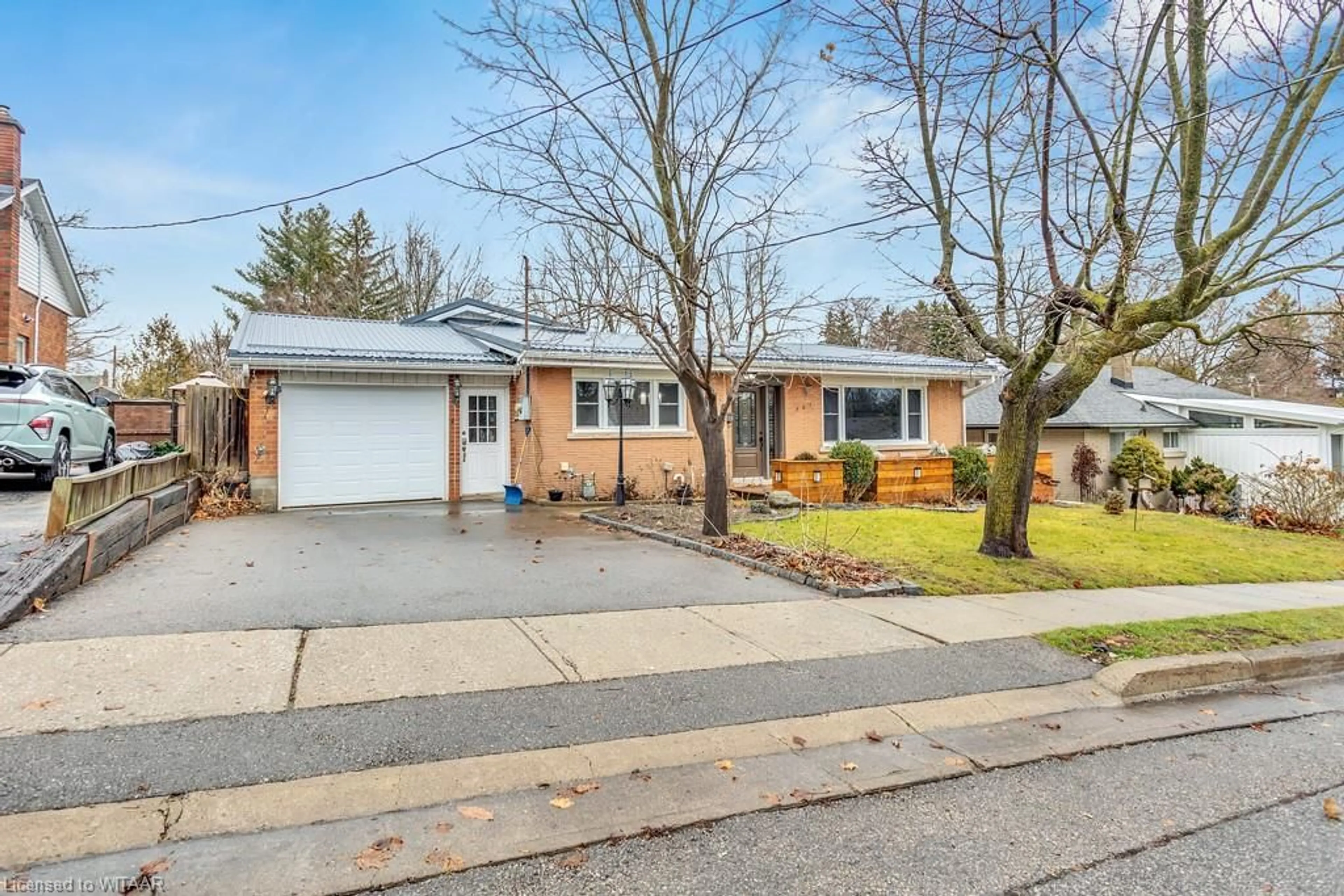 Home with brick exterior material, street for 301 South Dr, Simcoe Ontario N3Y 1G9