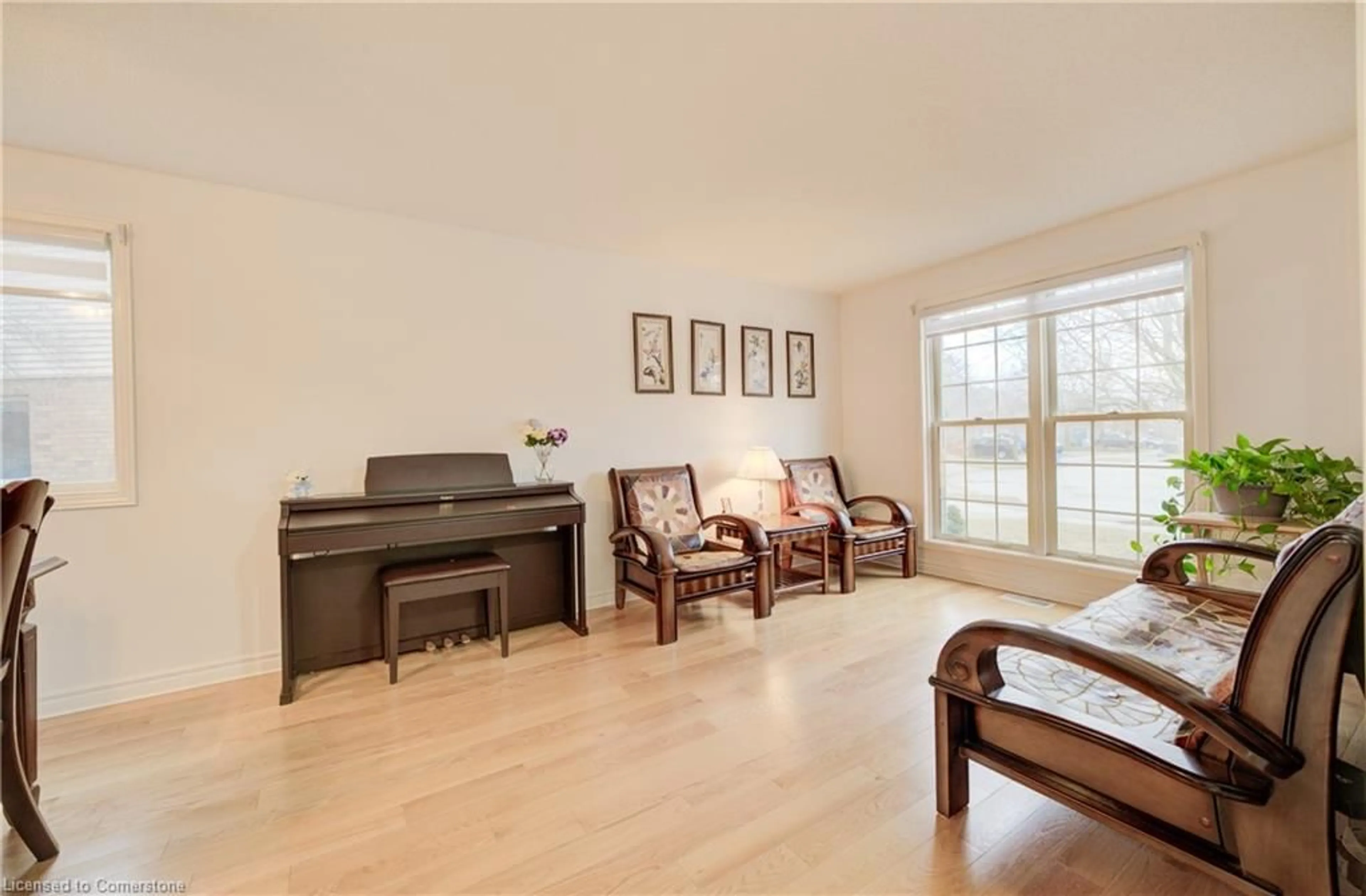 Living room with furniture, wood/laminate floor for 454 Timbercroft Cres, Waterloo Ontario N2T 2J2