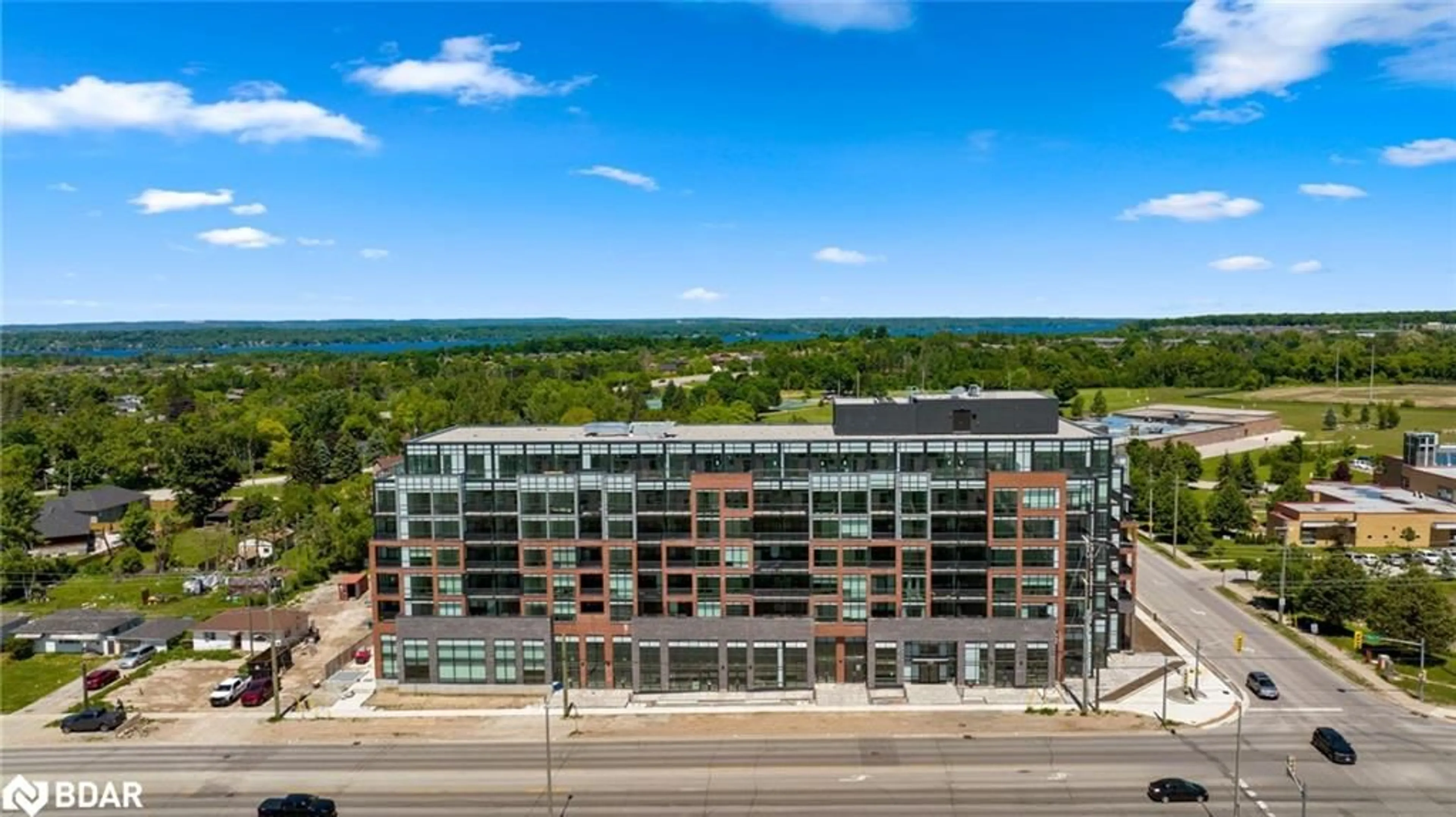 A pic from outside/outdoor area/front of a property/back of a property/a pic from drone, city buildings view from balcony for 681 Yonge St #502, Barrie Ontario L4N 4E8