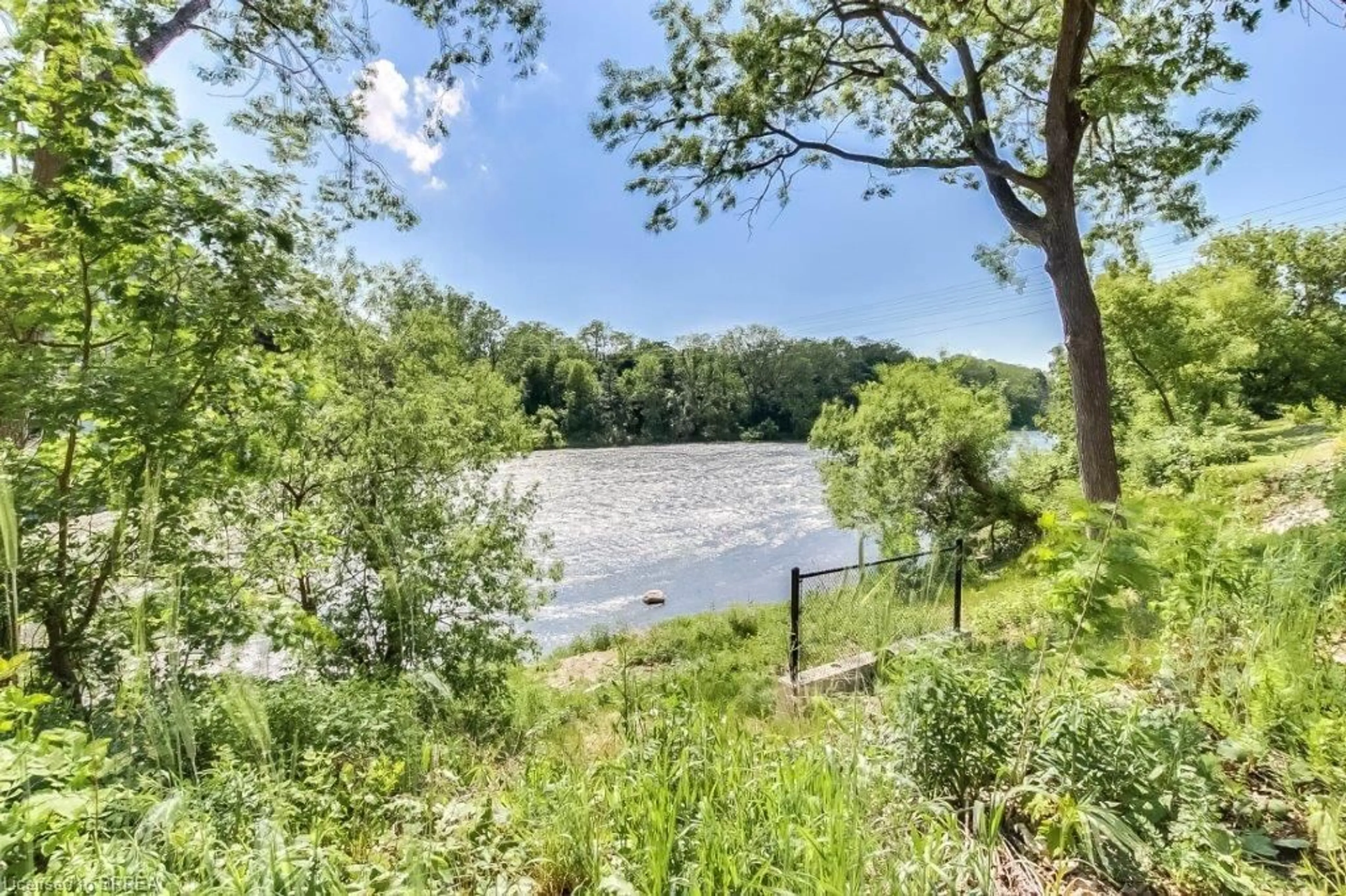 A pic from outside/outdoor area/front of a property/back of a property/a pic from drone, water/lake/river/ocean view for 2 Willow St #12, Paris Ontario N3L 0C6