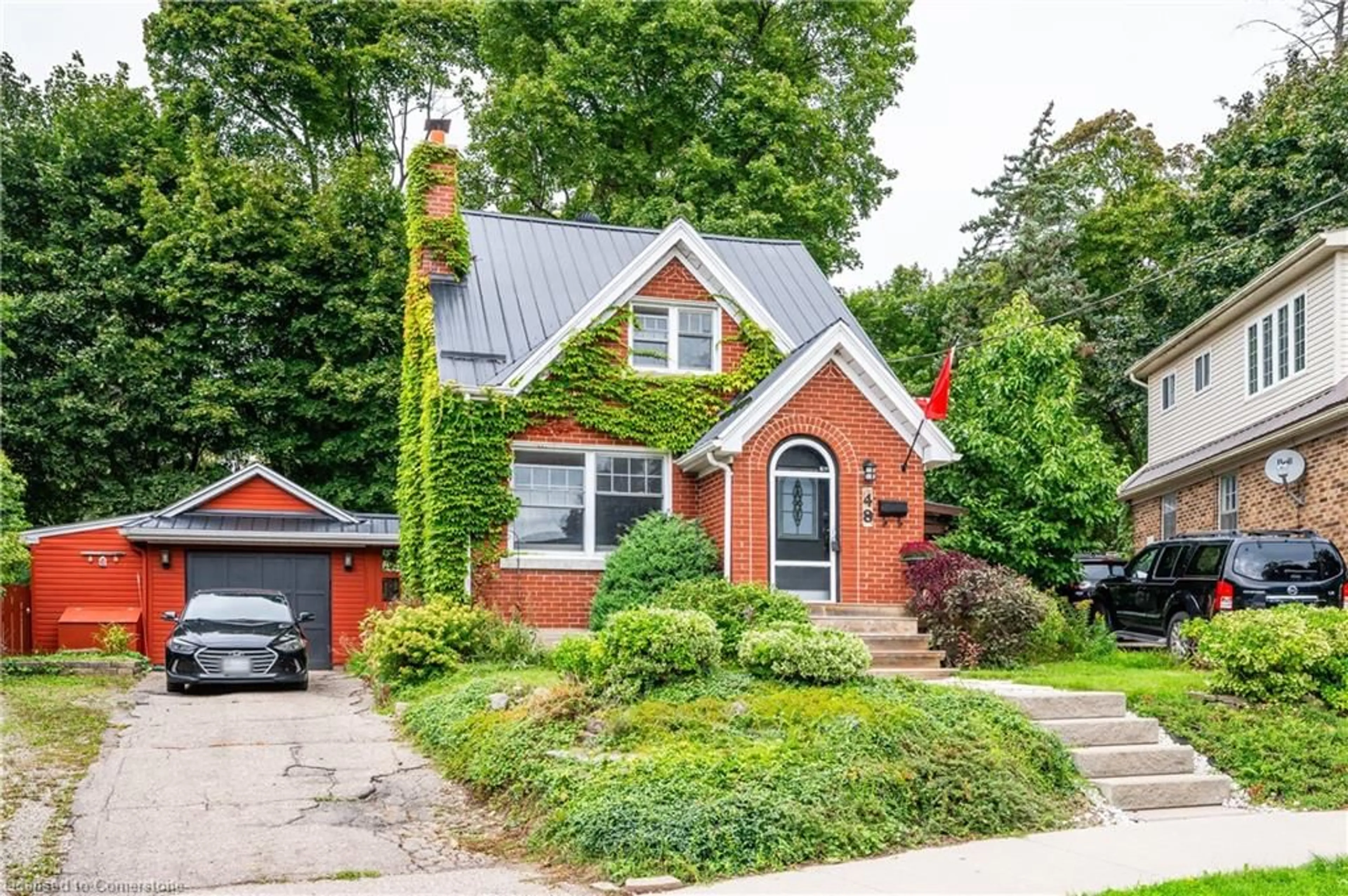 Home with brick exterior material, street for 48 Dane St, Kitchener Ontario N2H 3H7