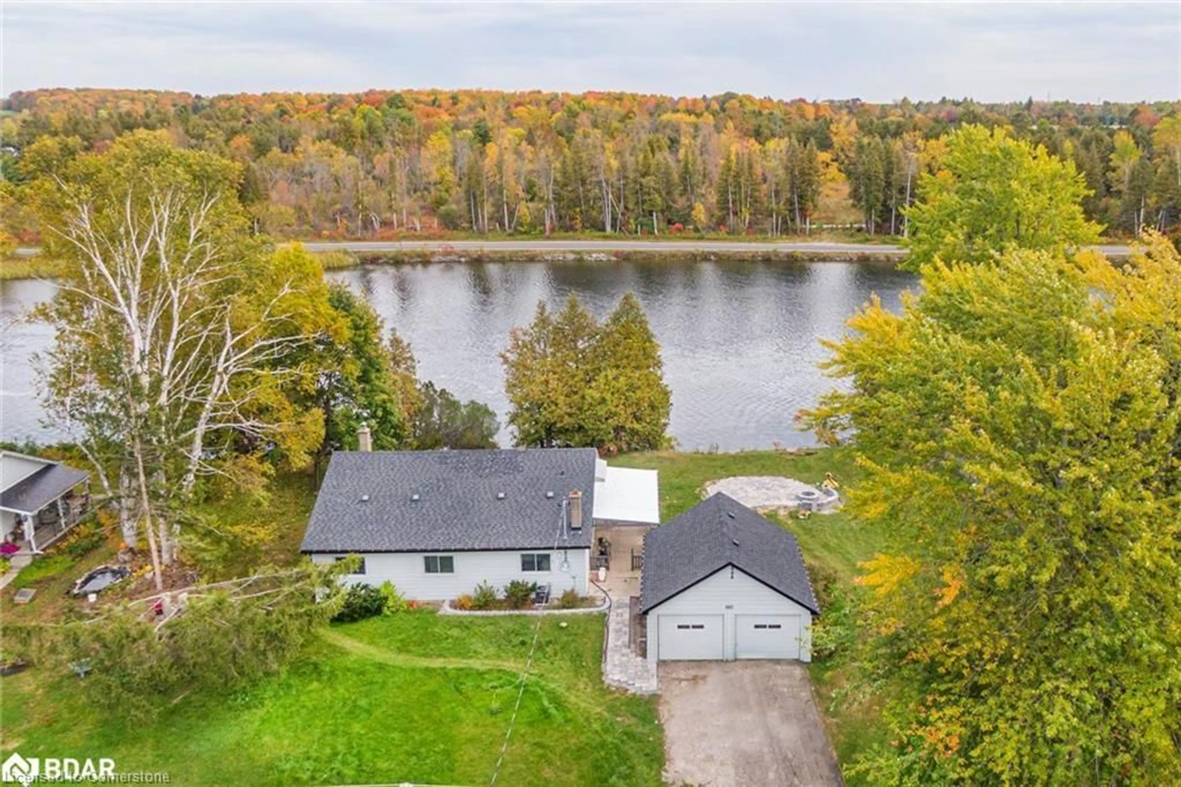 A pic from outside/outdoor area/front of a property/back of a property/a pic from drone, water/lake/river/ocean view for 885 Glen Cedar Dr, Peterborough Ontario K9J 6X5