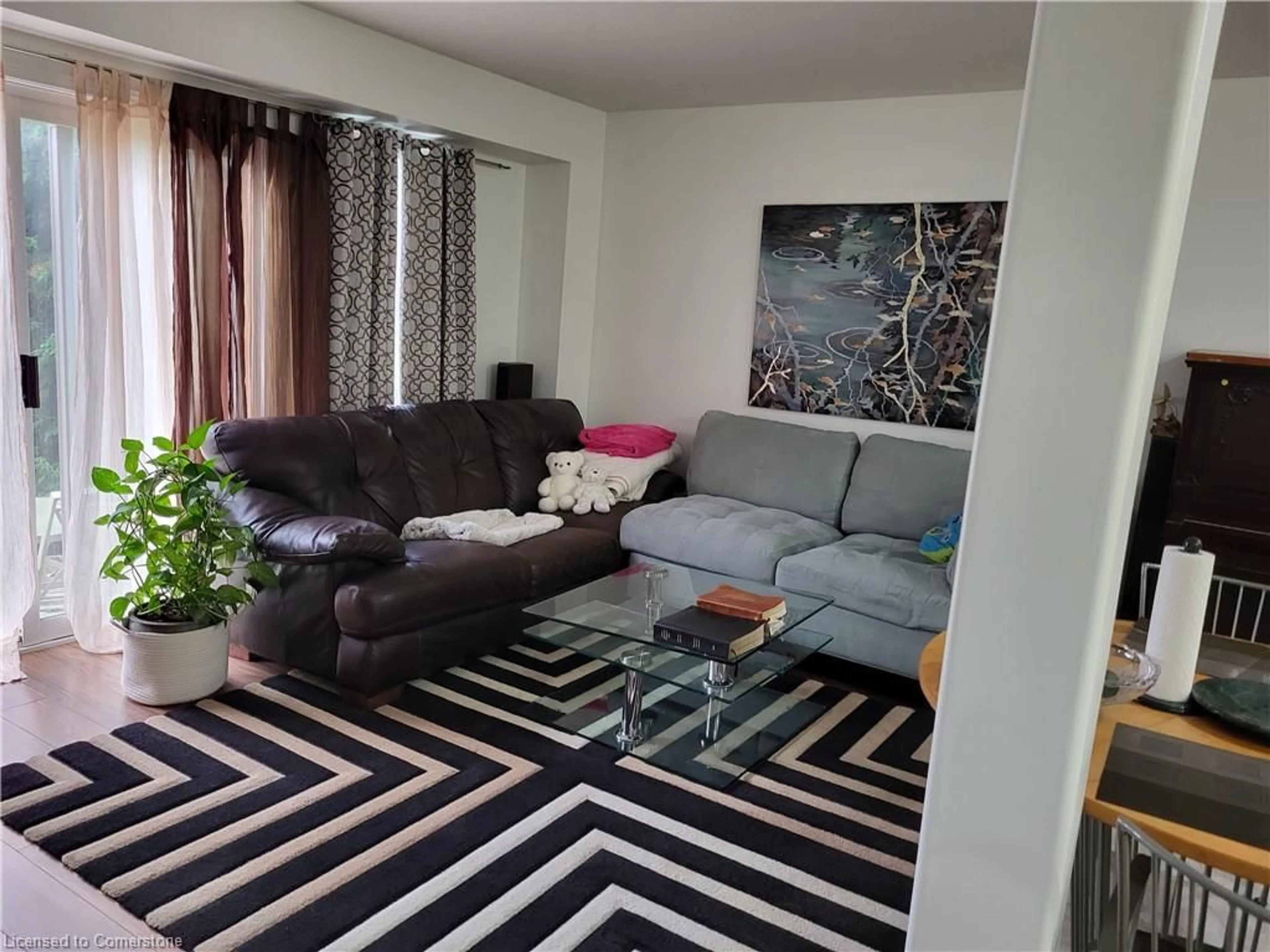 Living room with furniture, unknown for 85 Bankside Dr #E34, Kitchener Ontario N2N 3M4