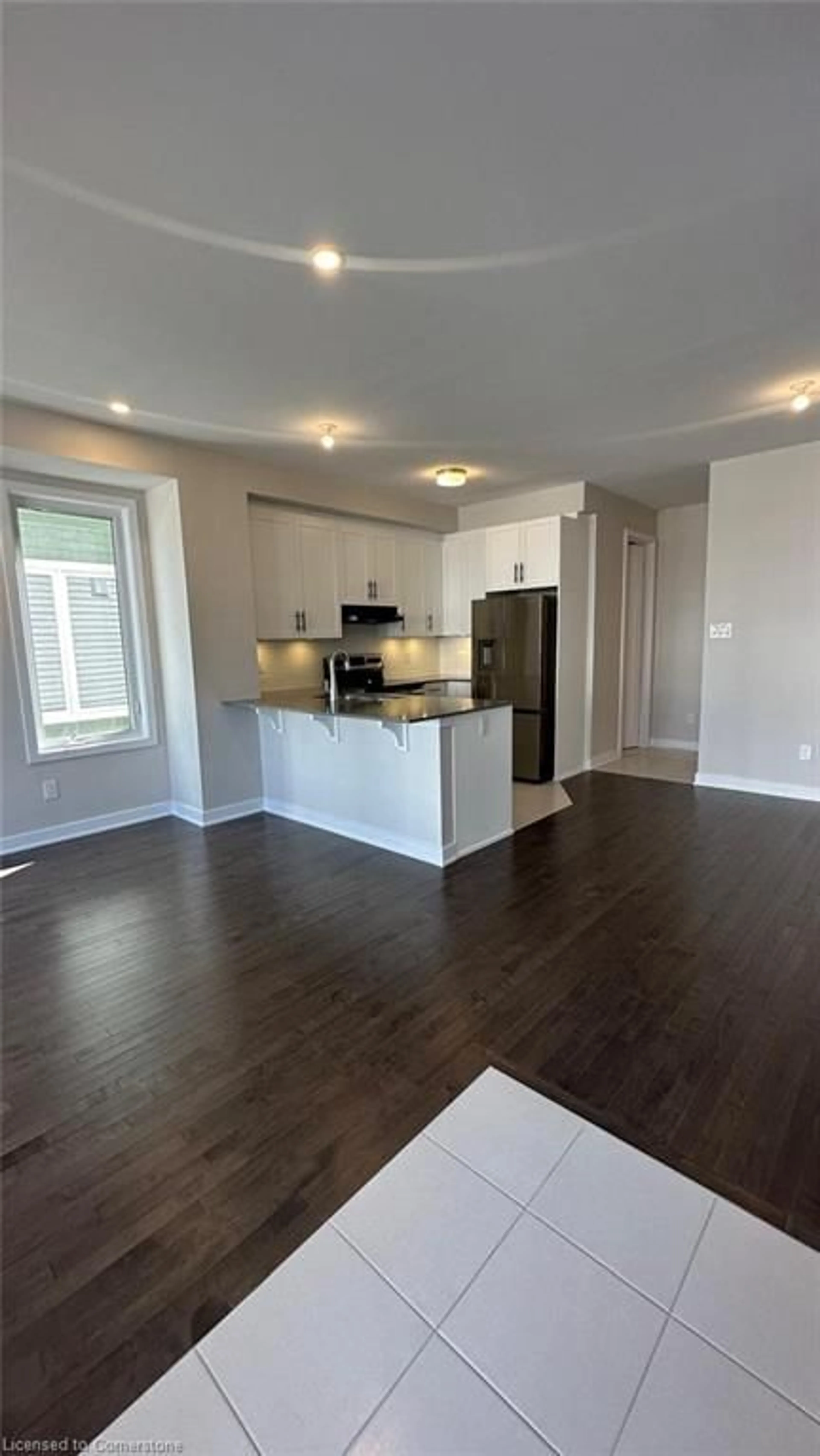 Open concept kitchen, wood/laminate floor for 29 Chasing Grove, Ottawa Ontario K0A 2Z0