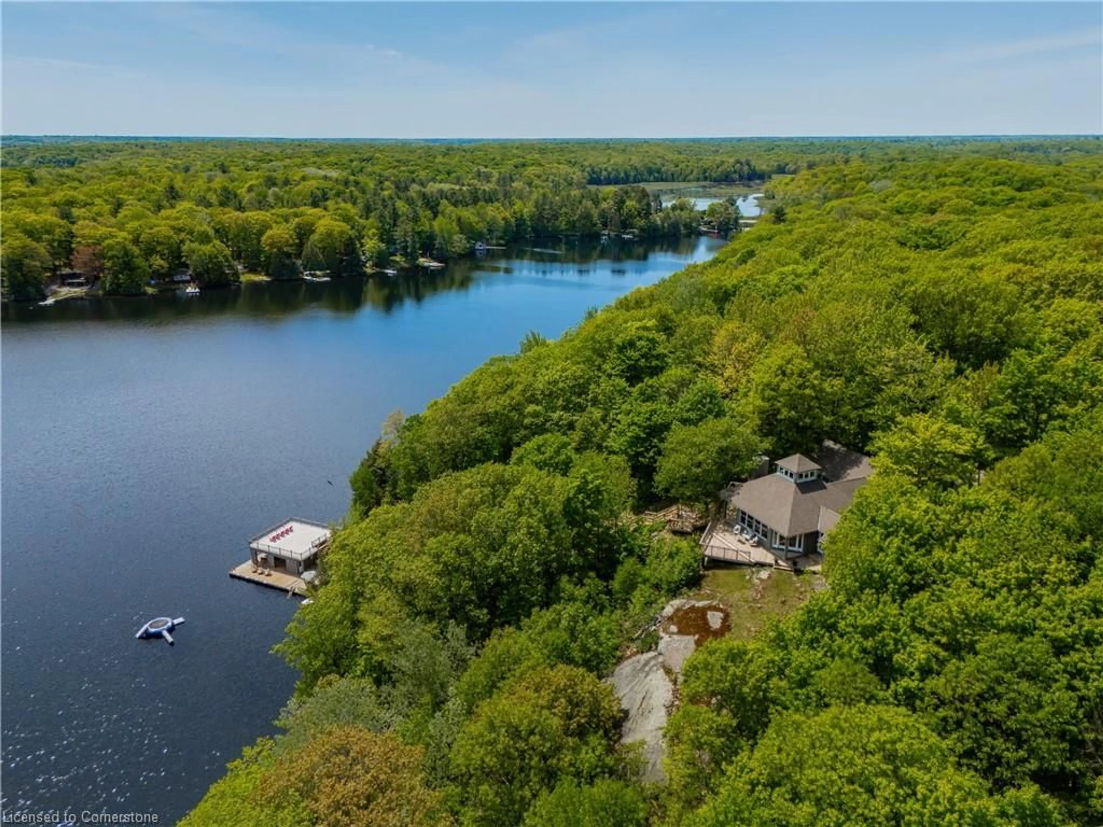 A pic from outside/outdoor area/front of a property/back of a property/a pic from drone, water/lake/river/ocean view for 1010 North Dr, Port Carling Ontario P0B 1G0