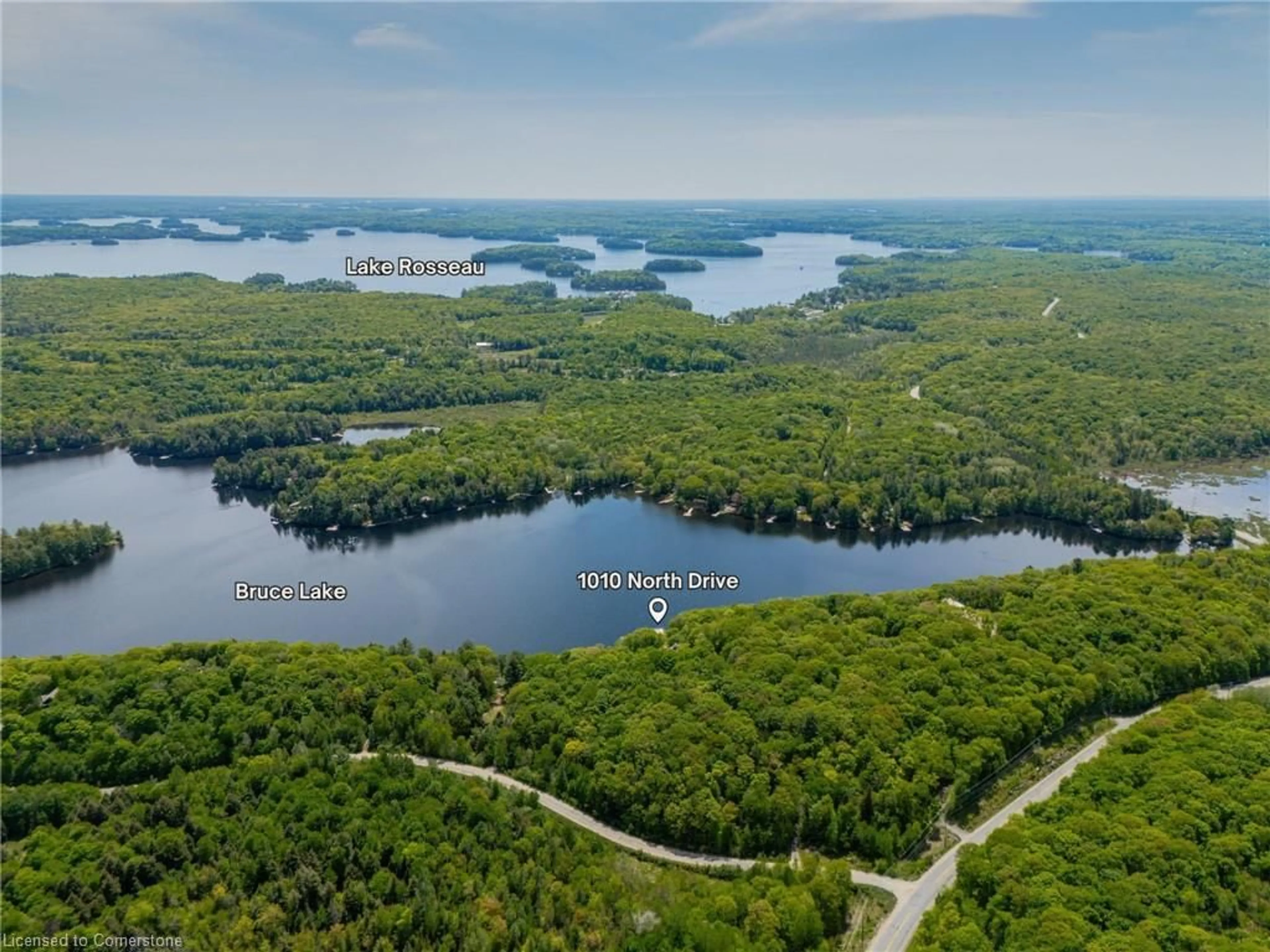 A pic from outside/outdoor area/front of a property/back of a property/a pic from drone, water/lake/river/ocean view for 1010 North Dr, Port Carling Ontario P0B 1G0