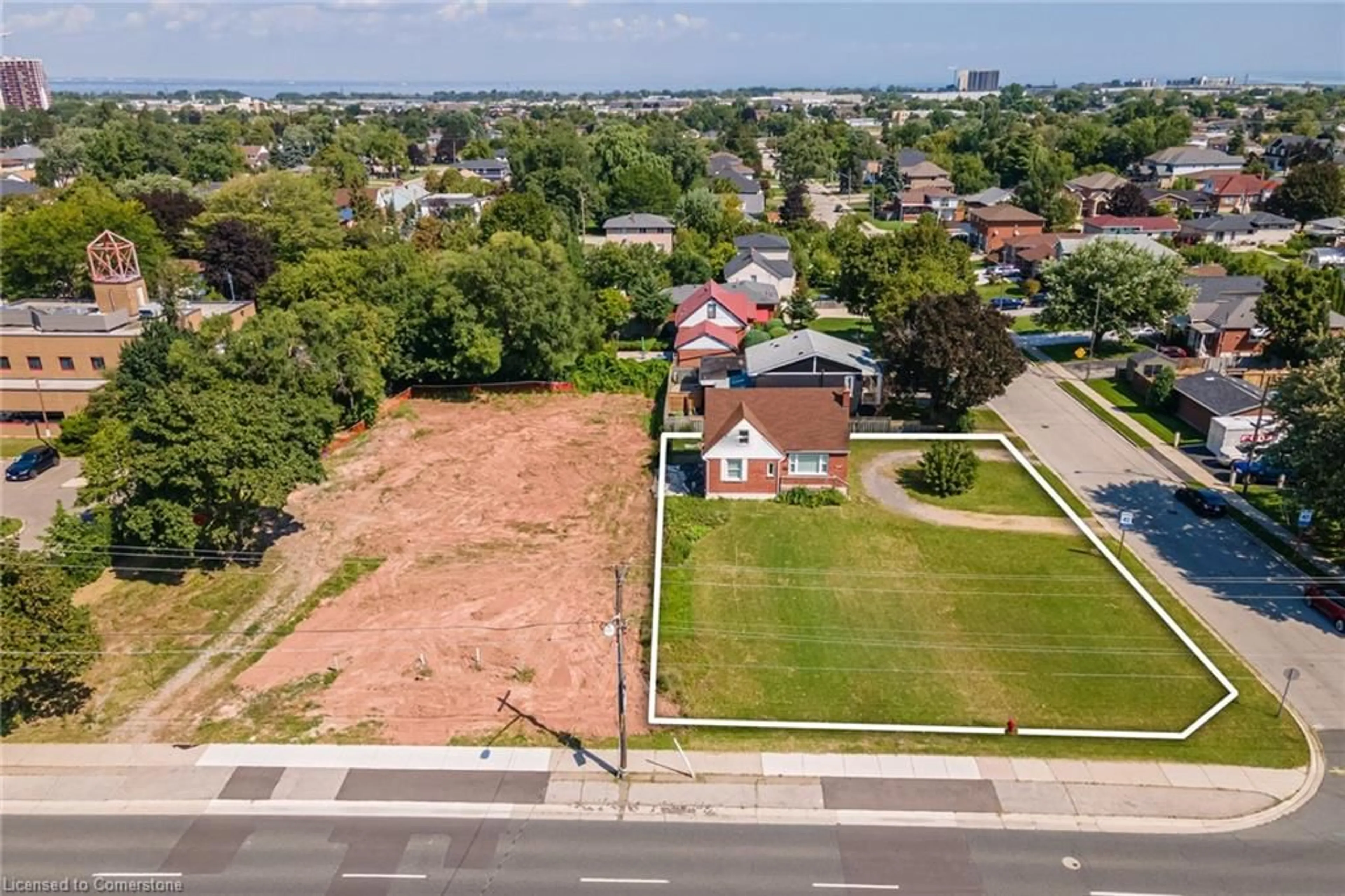 A pic from outside/outdoor area/front of a property/back of a property/a pic from drone, street for 209 Highway 8, Stoney Creek Ontario L8G 1C6