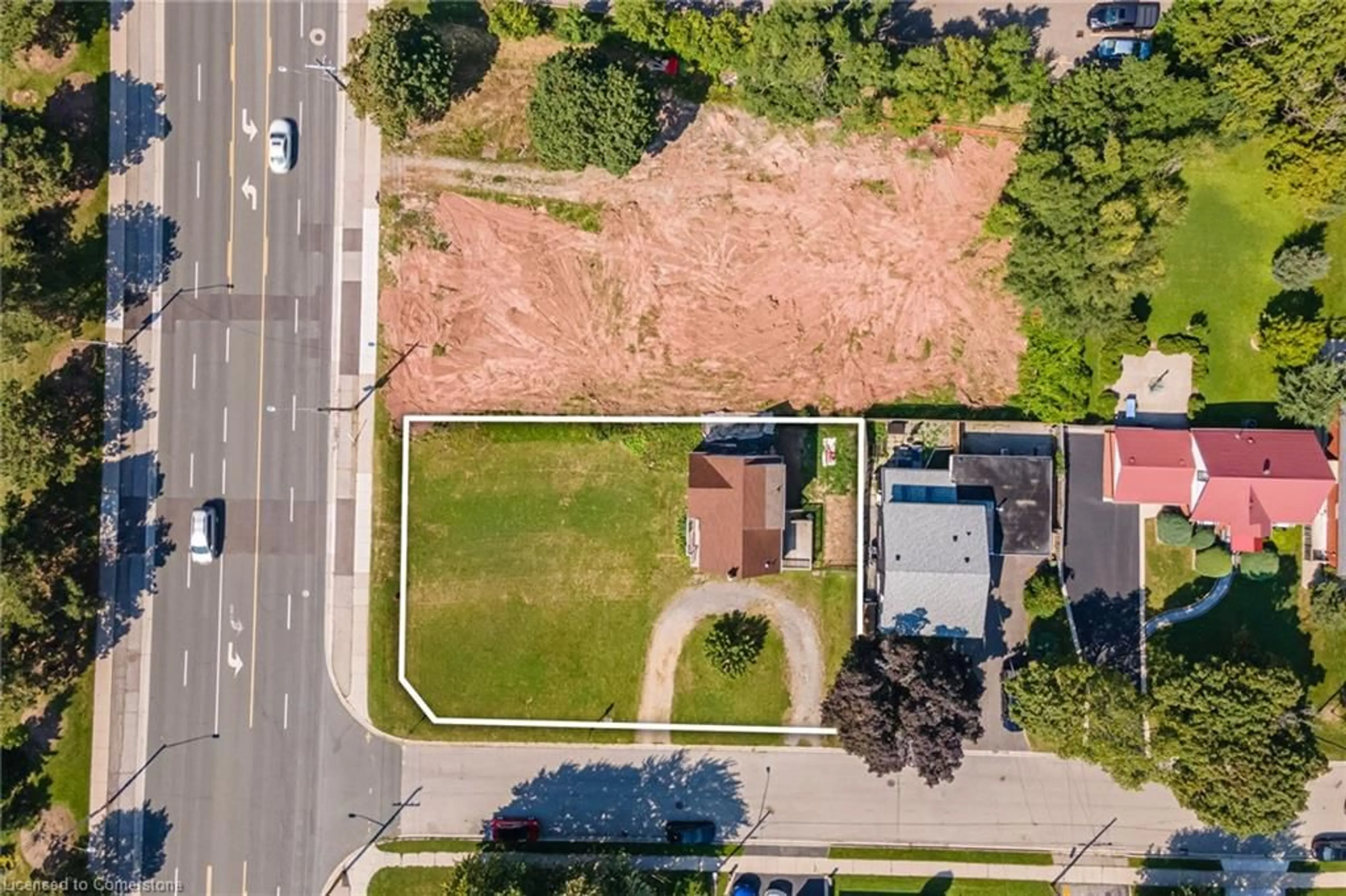 A pic from outside/outdoor area/front of a property/back of a property/a pic from drone, street for 209 Highway 8, Stoney Creek Ontario L8G 1C6