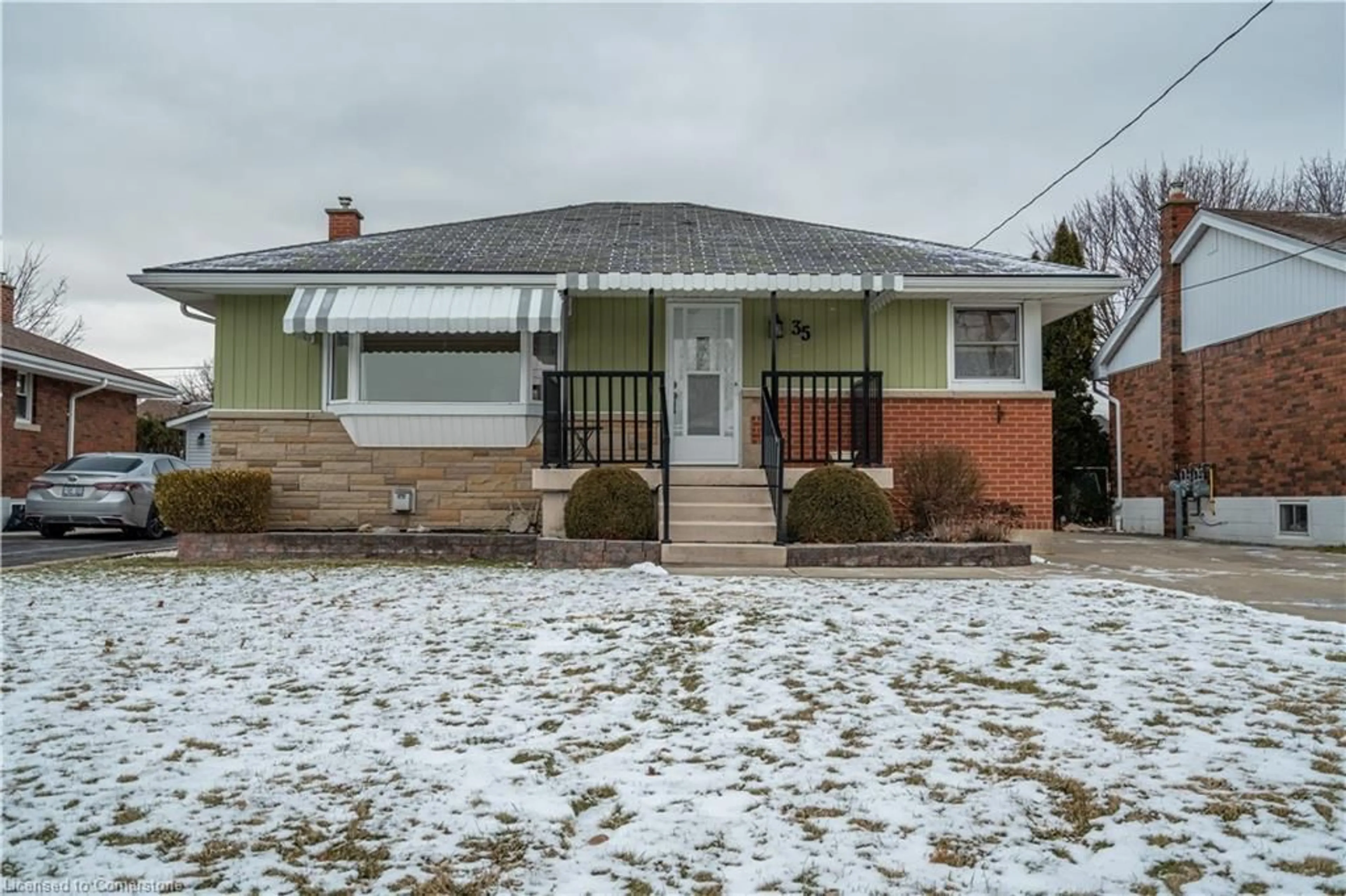 Home with brick exterior material, street for 35 Wildewood Ave, Hamilton Ontario L8T 1X4