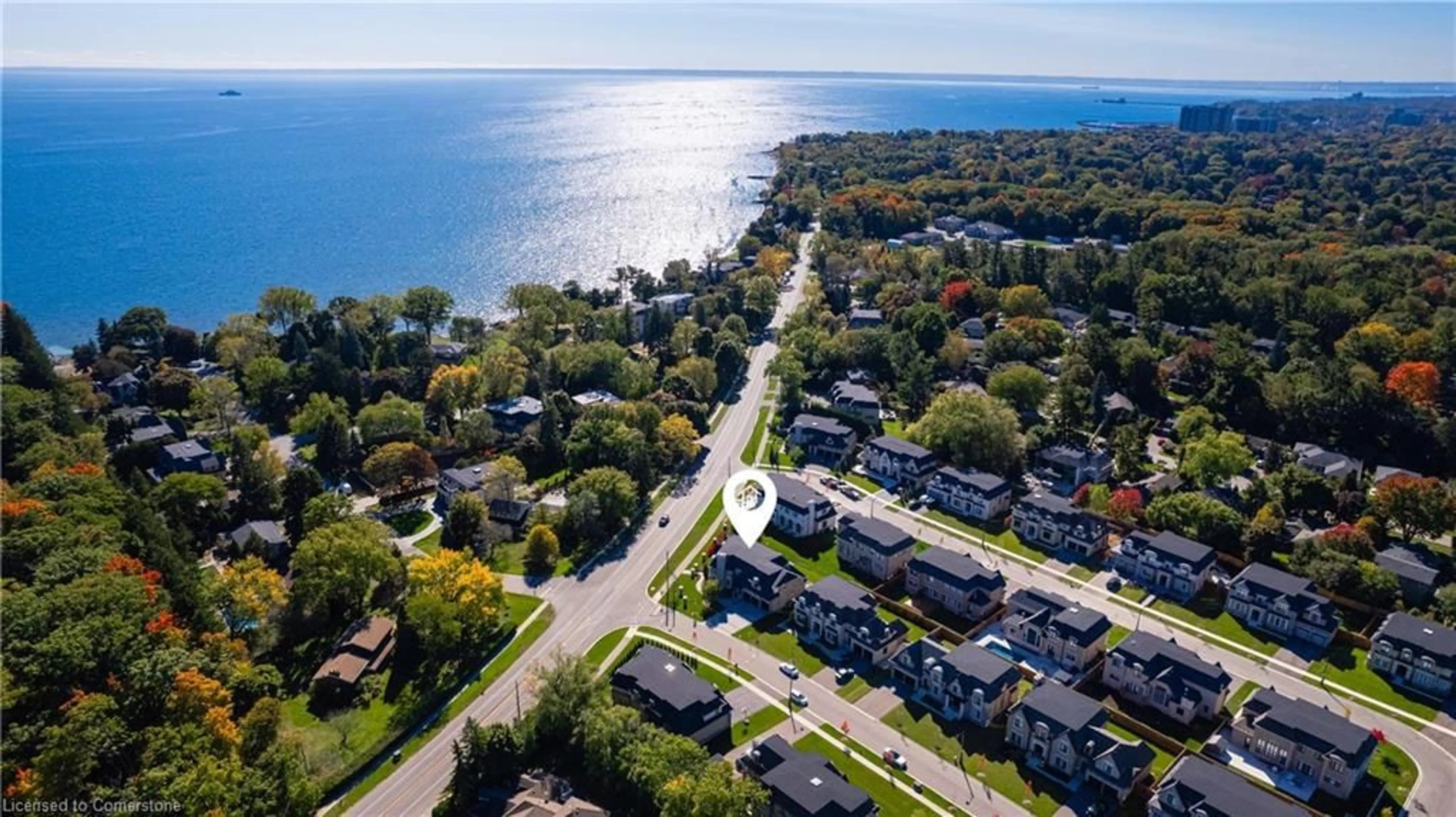 A pic from outside/outdoor area/front of a property/back of a property/a pic from drone, water/lake/river/ocean view for 1207 Lakeshore Road West Rd, Oakville Ontario L6L 1E7