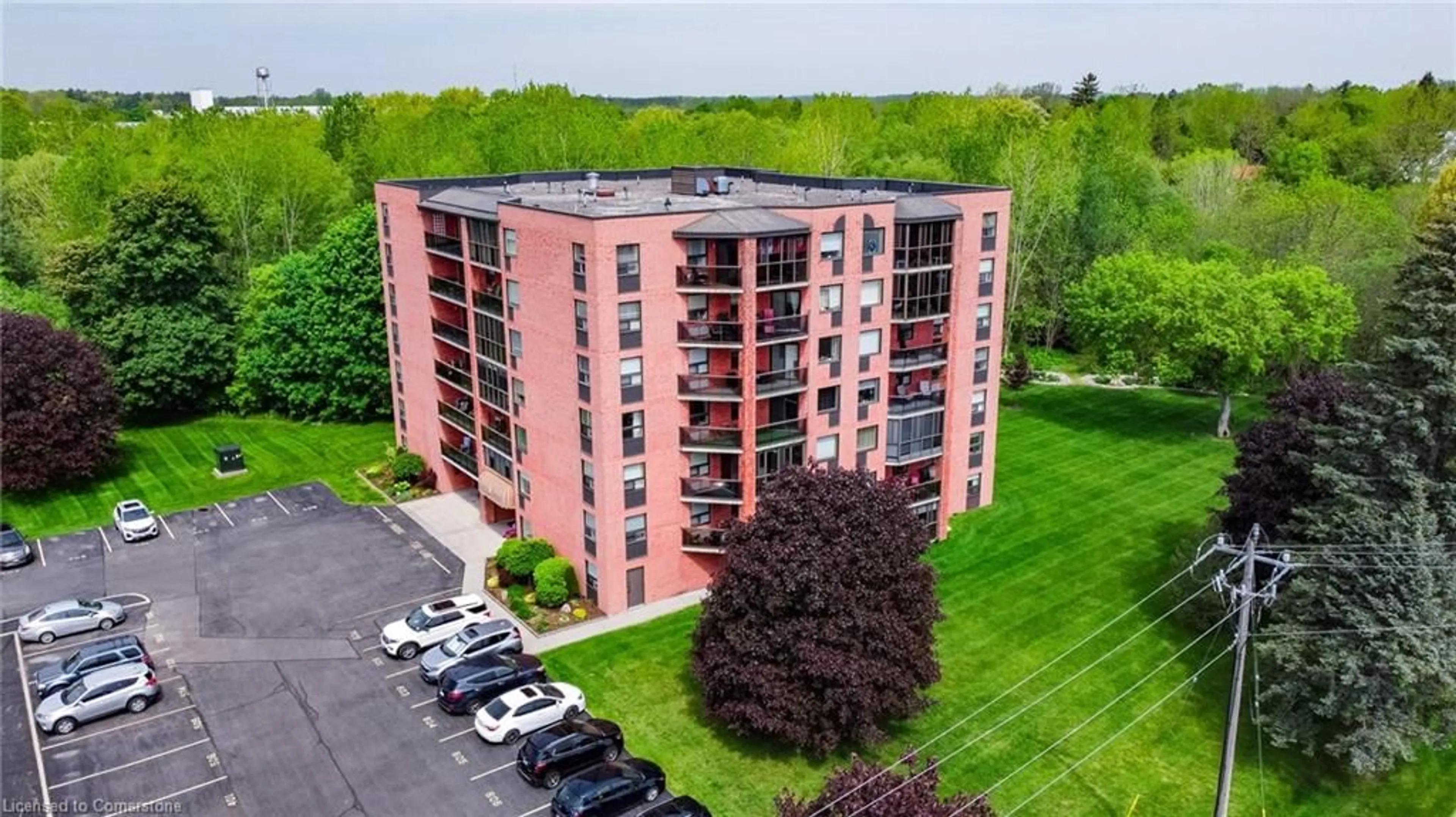 A pic from outside/outdoor area/front of a property/back of a property/a pic from drone, building for 5 Mill Pond Crt #402, Simcoe Ontario N3Y 5J6