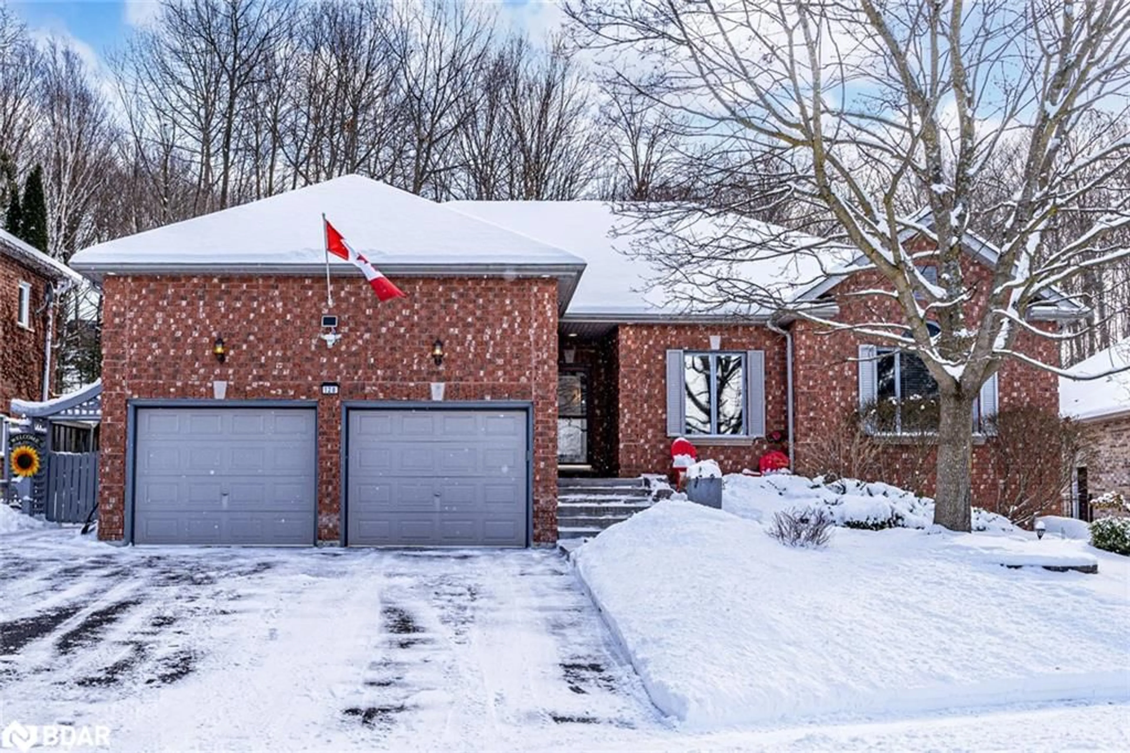 Home with brick exterior material, street for 128 Wildwood Trail, Barrie Ontario L4N 7Z6