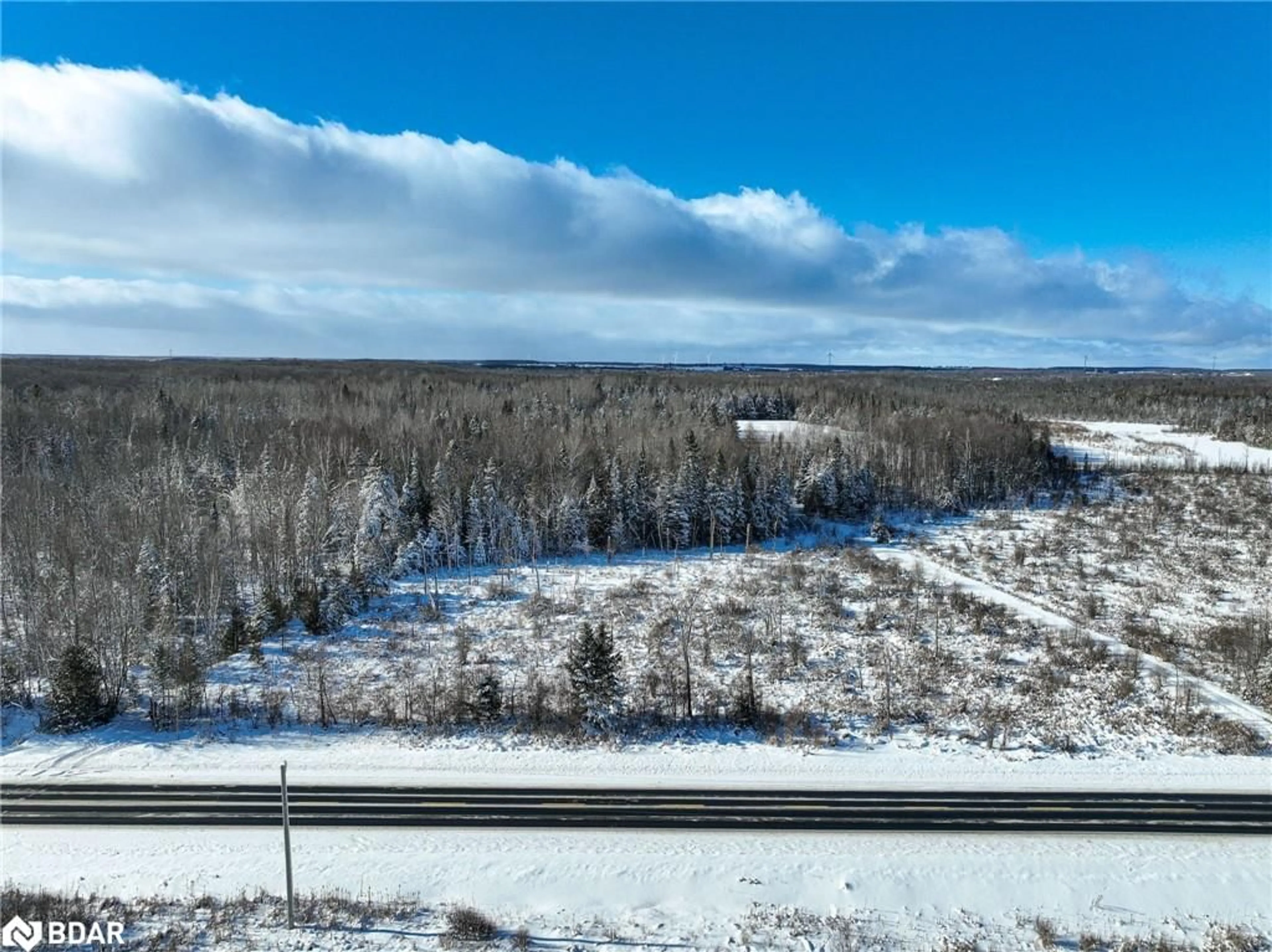 A pic from outside/outdoor area/front of a property/back of a property/a pic from drone, water/lake/river/ocean view for 793510 County Rd 124, Grey Highlands Ontario N0C 1M0