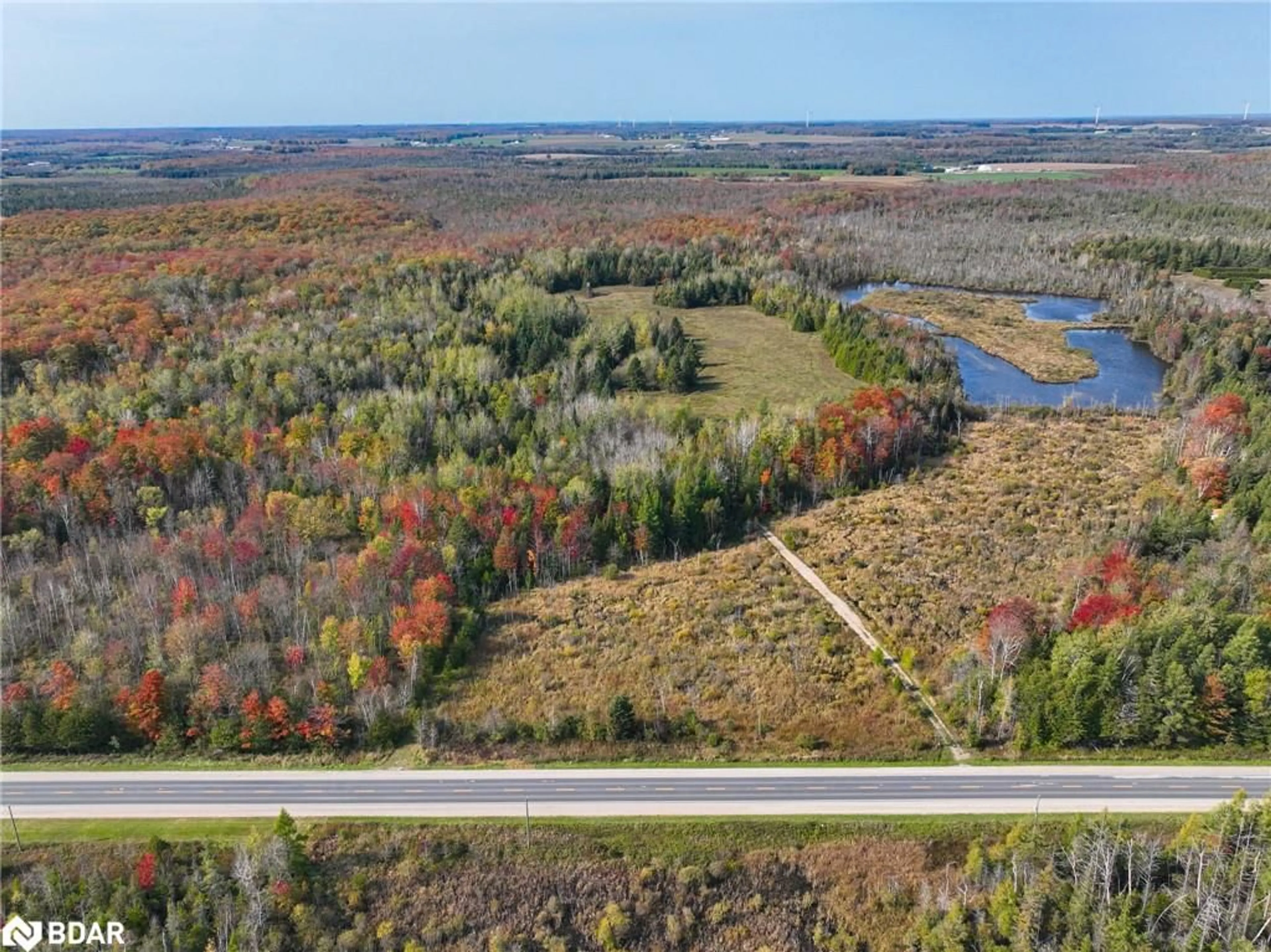 A pic from outside/outdoor area/front of a property/back of a property/a pic from drone, forest/trees view for 793510 County Rd 124, Grey Highlands Ontario N0C 1M0