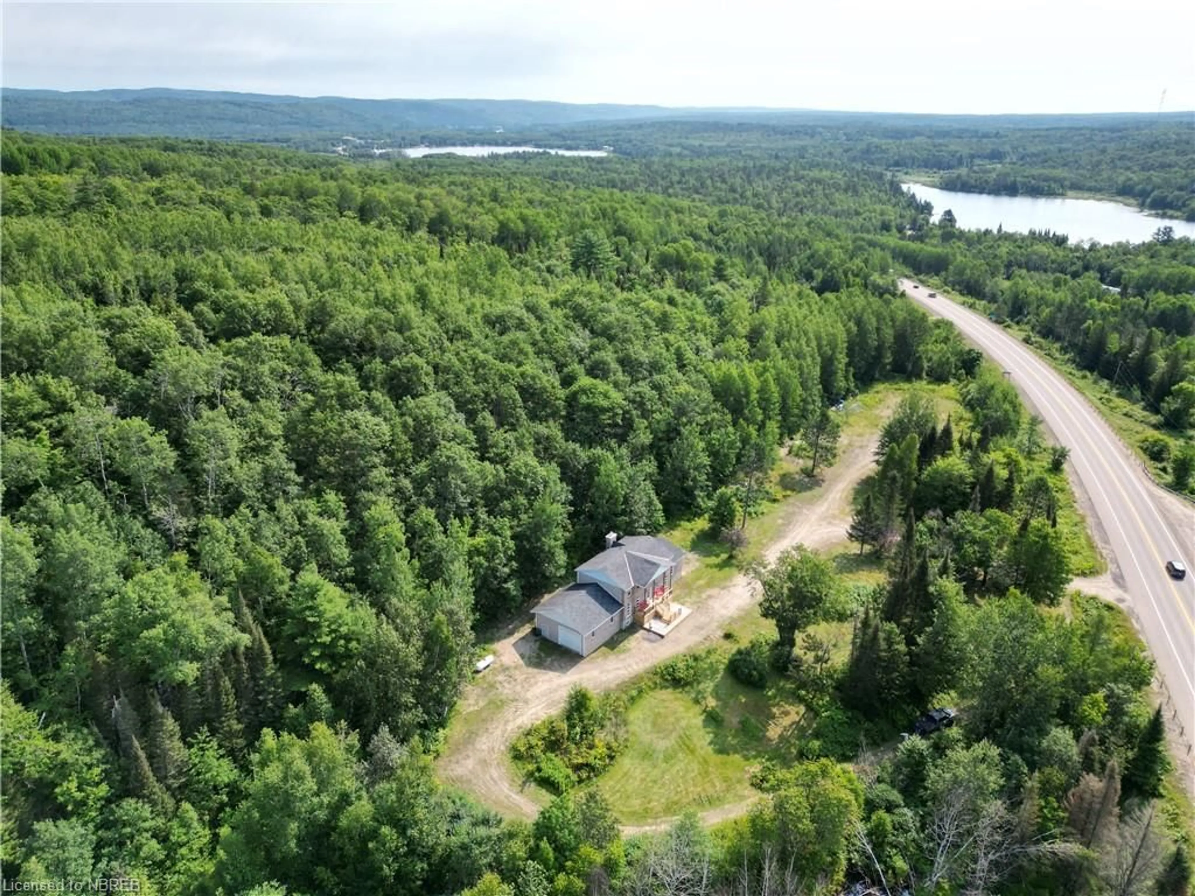 A pic from outside/outdoor area/front of a property/back of a property/a pic from drone, forest/trees view for 5797 Highway 17, Mattawa Ontario P0V 1V0